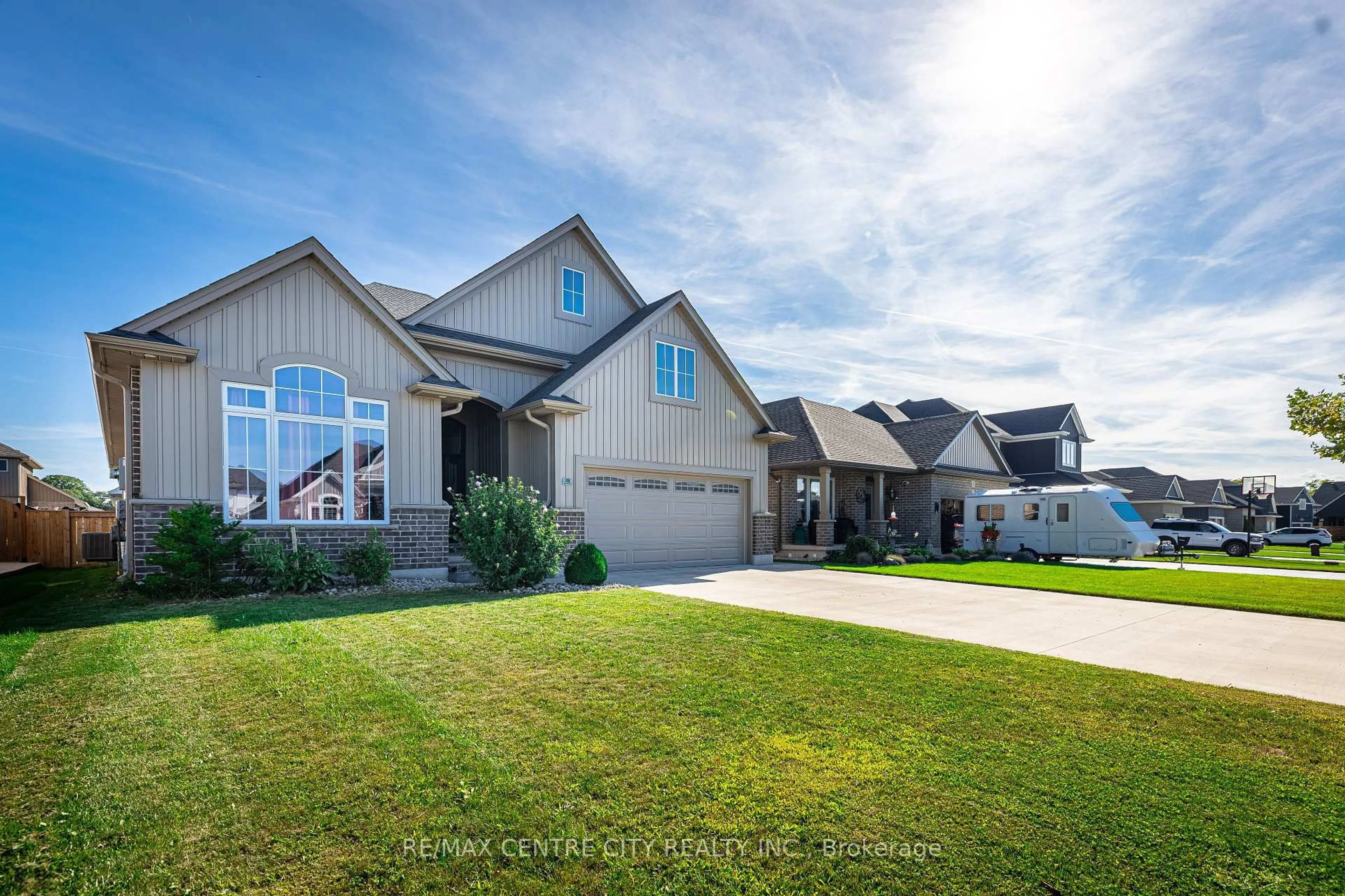 Home with vinyl exterior material, street for 18 Murifield Dr, St. Thomas Ontario N5R 0K3