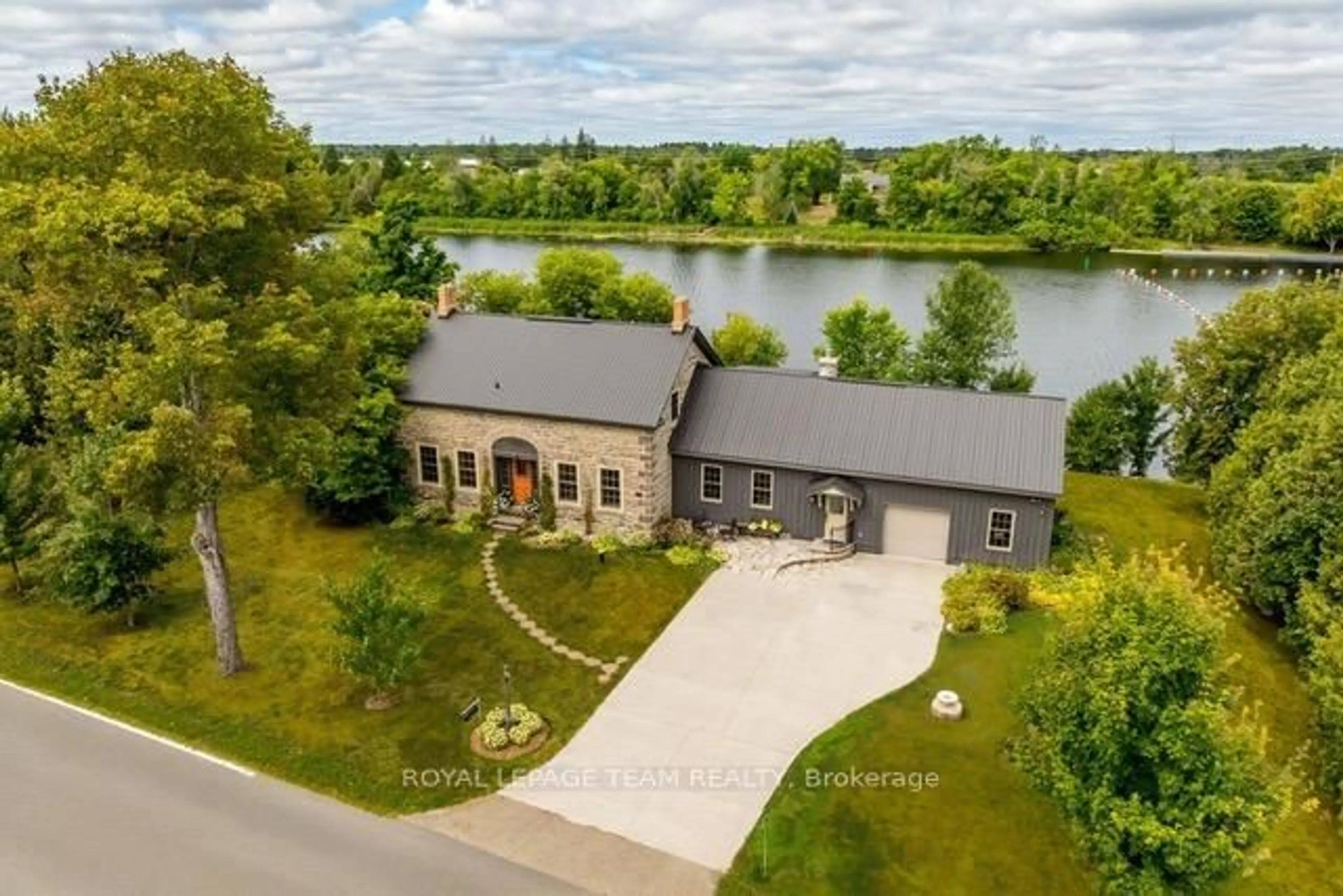 A pic from outside/outdoor area/front of a property/back of a property/a pic from drone, water/lake/river/ocean view for 437 County 23 Rd, Merrickville-Wolford Ontario K0G 1N0