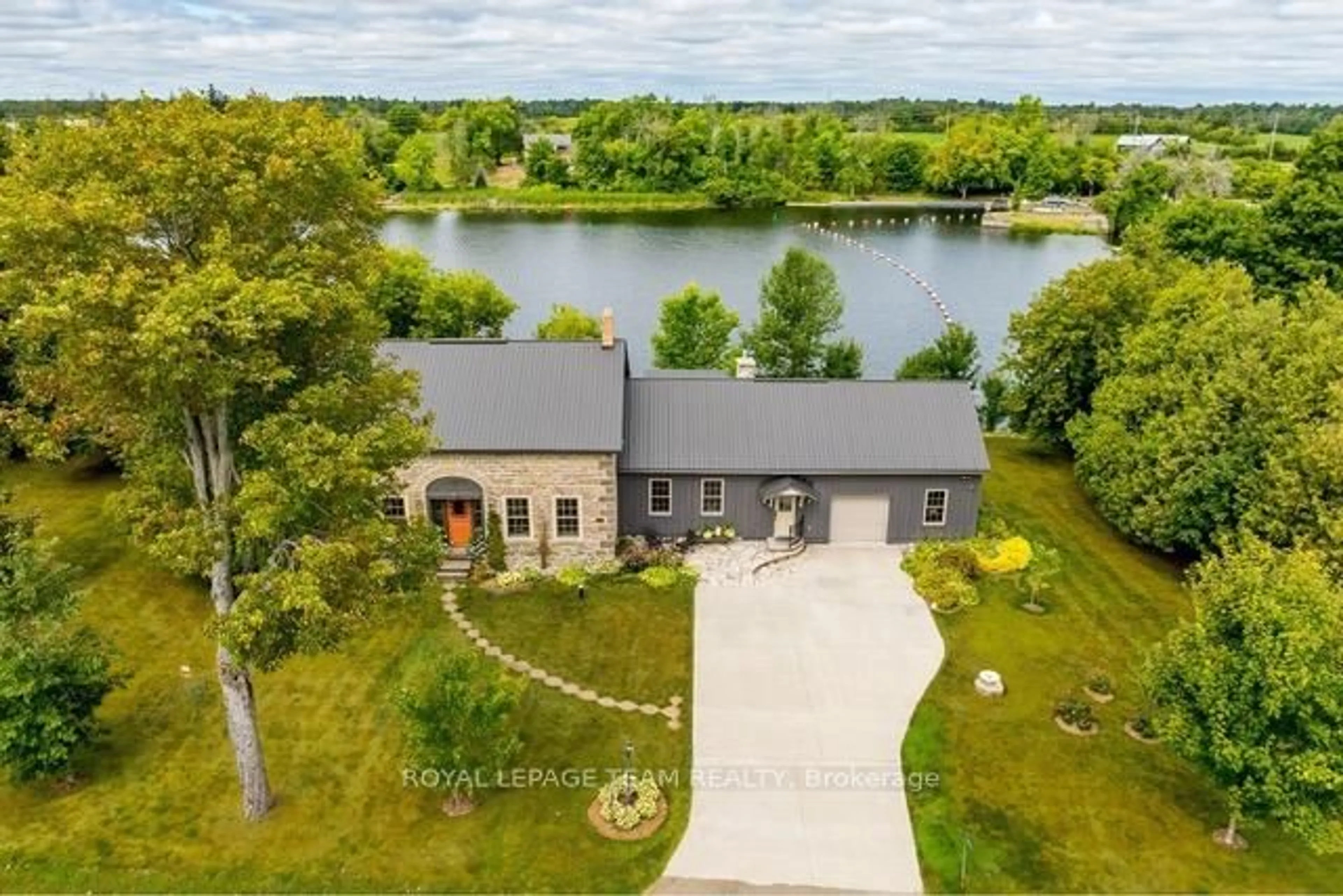 A pic from outside/outdoor area/front of a property/back of a property/a pic from drone, water/lake/river/ocean view for 437 County 23 Rd, Merrickville-Wolford Ontario K0G 1N0