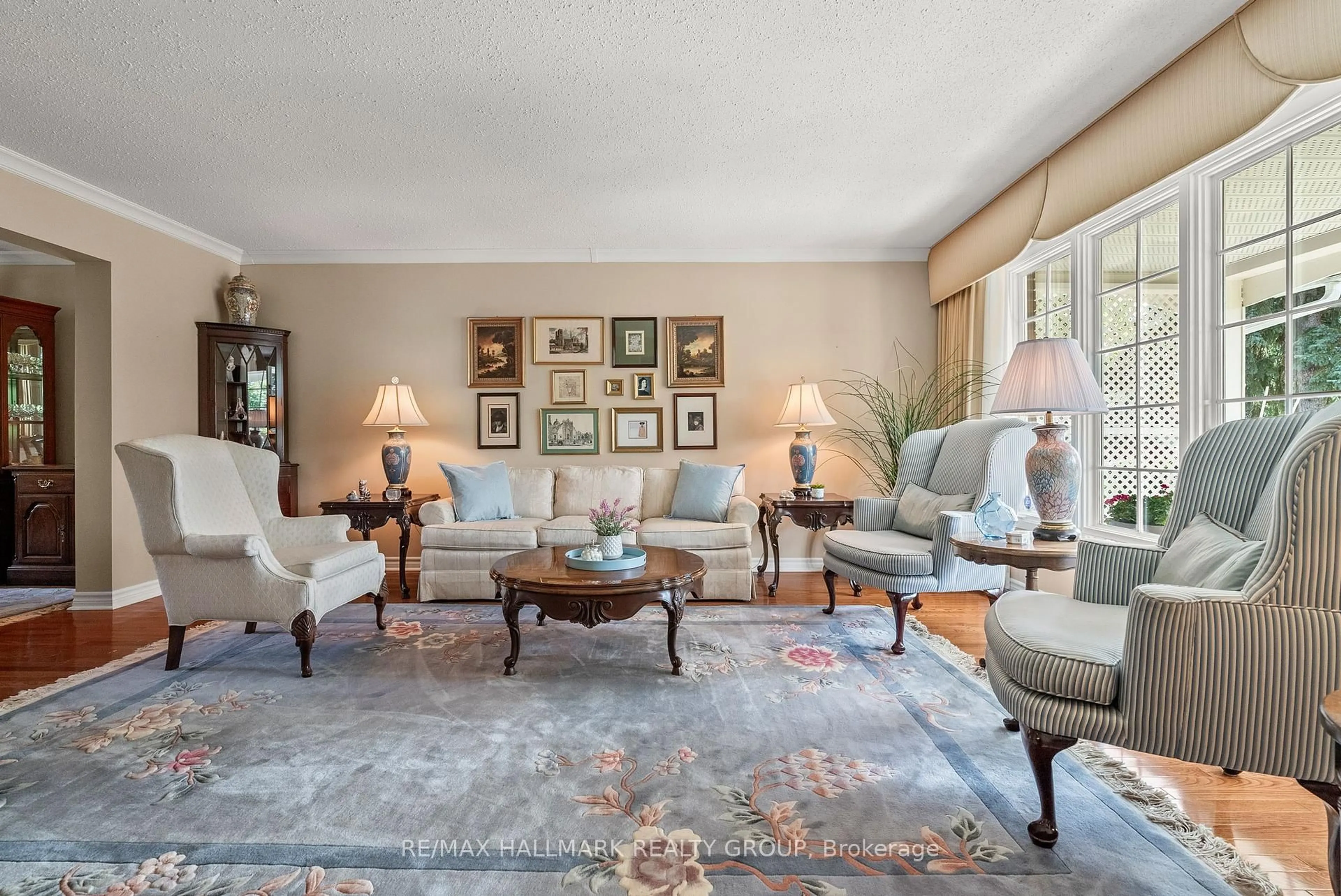Living room with furniture, carpet floor for 52 Knollsbrook Dr, Ottawa Ontario K2J 1K8