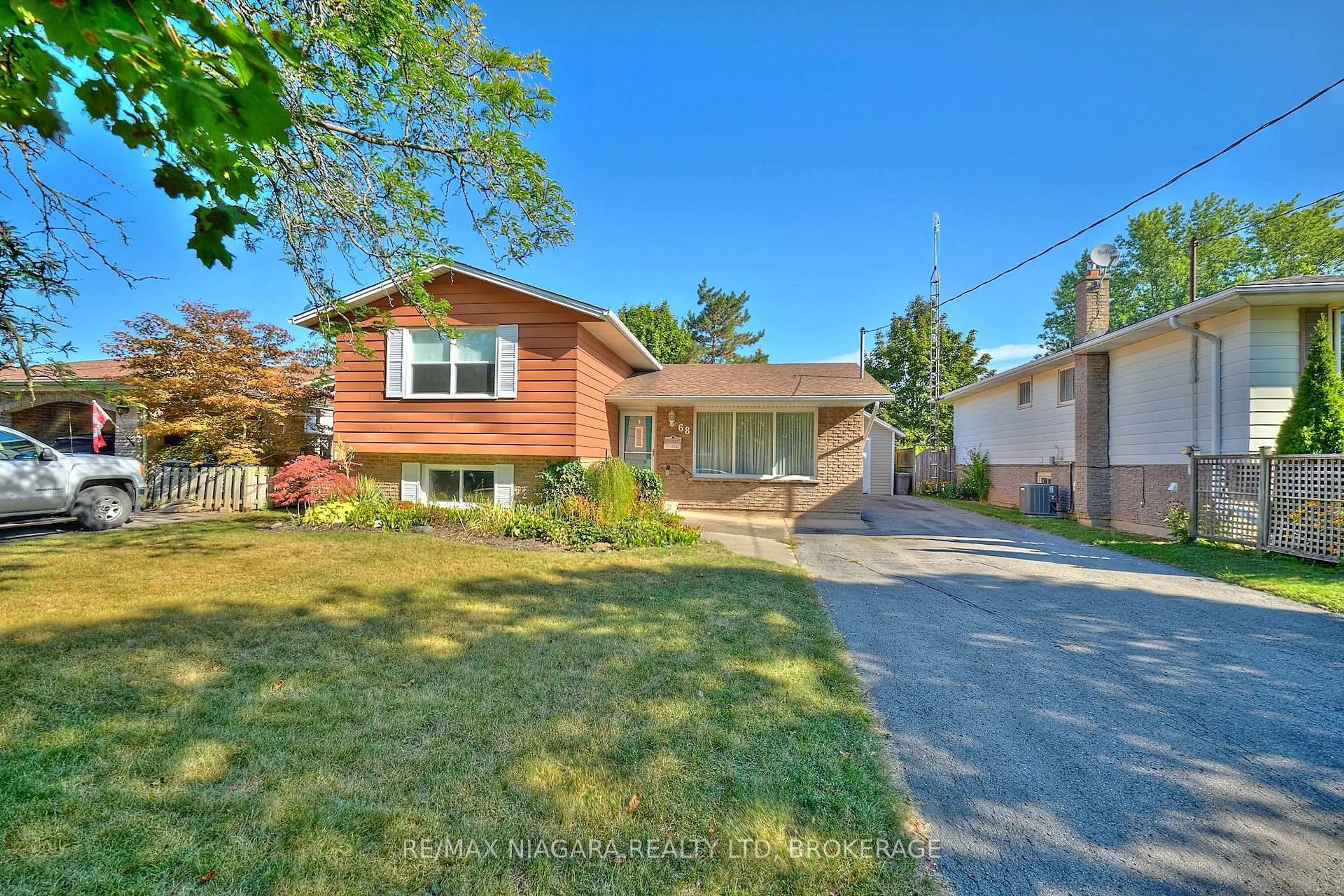 Home with brick exterior material, street for 68 Acadia Cres, St. Catharines Ontario L2P 1H8