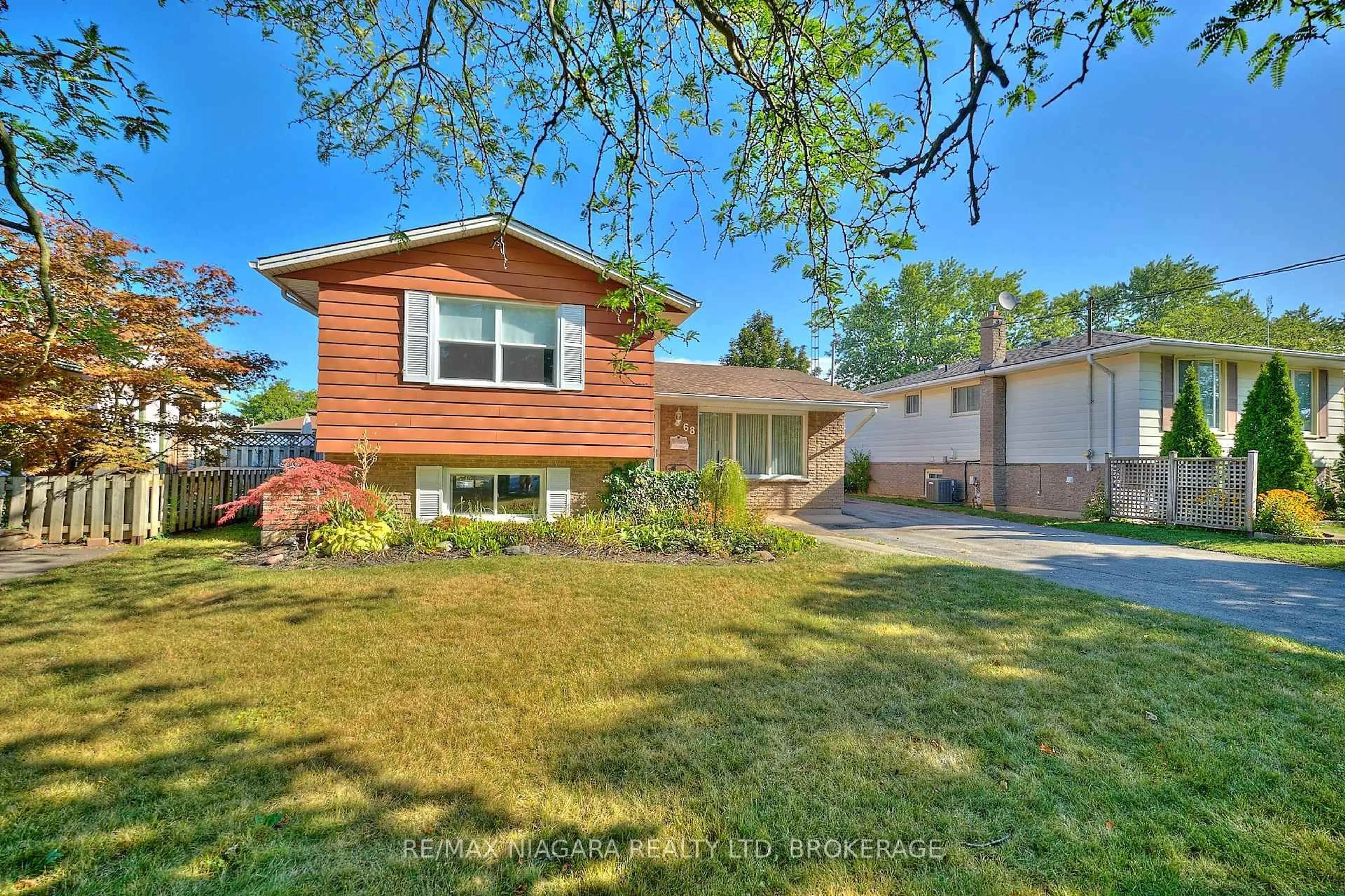 Home with brick exterior material, street for 68 Acadia Cres, St. Catharines Ontario L2P 1H8