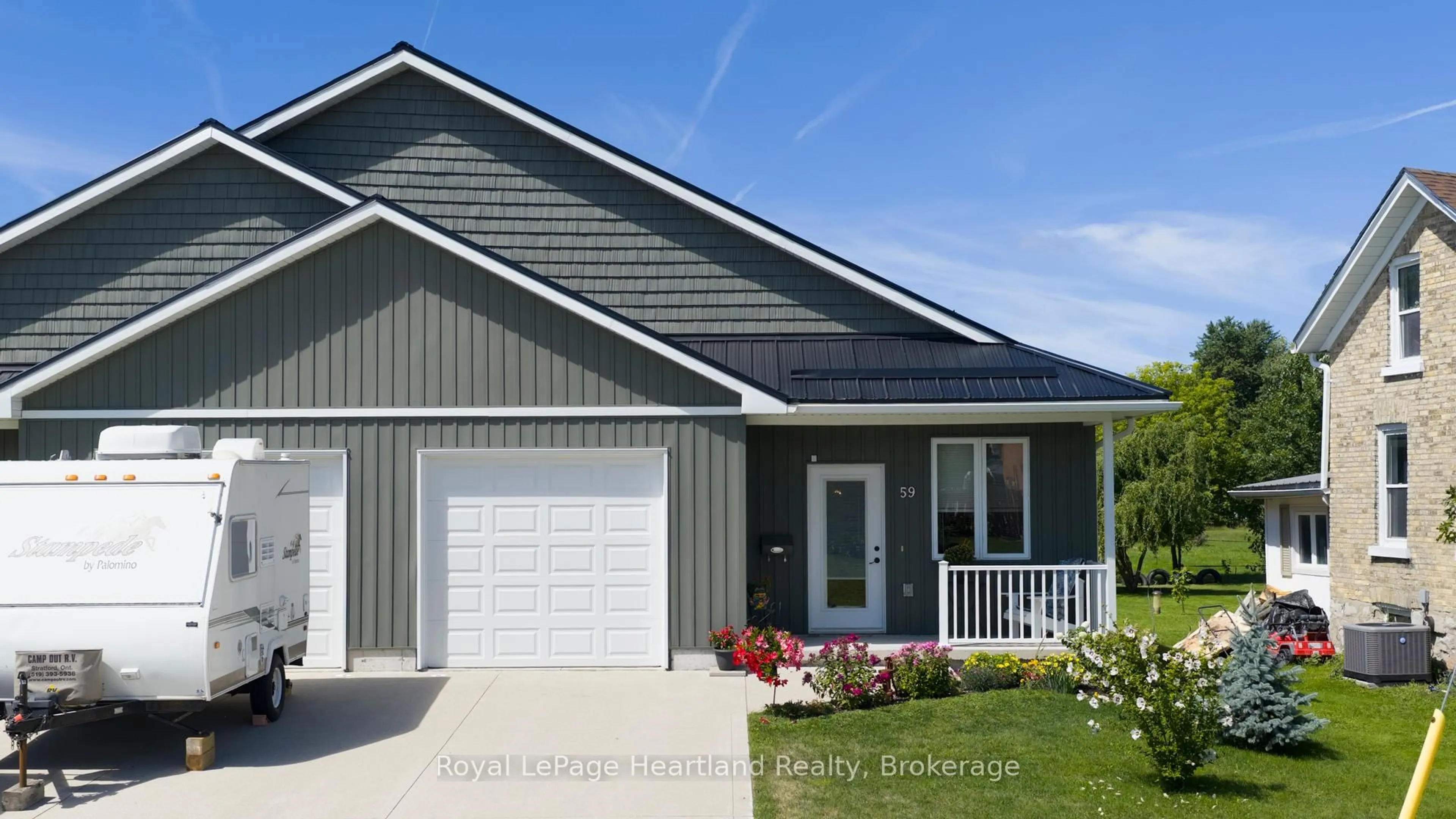Home with vinyl exterior material, street for 59 Louisa St, Huron East Ontario N0K 1W0