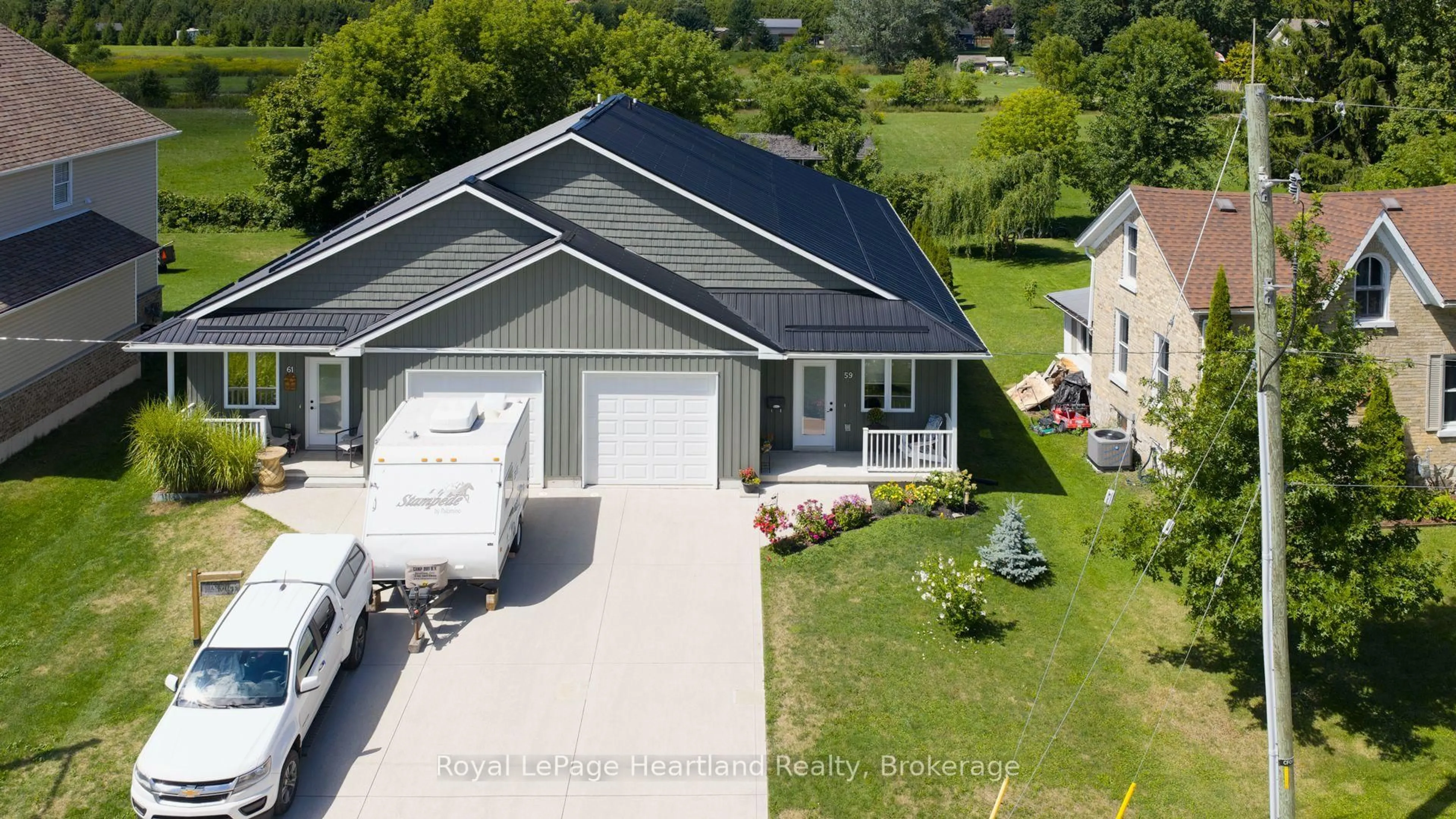 A pic from outside/outdoor area/front of a property/back of a property/a pic from drone, street for 59 Louisa St, Huron East Ontario N0K 1W0