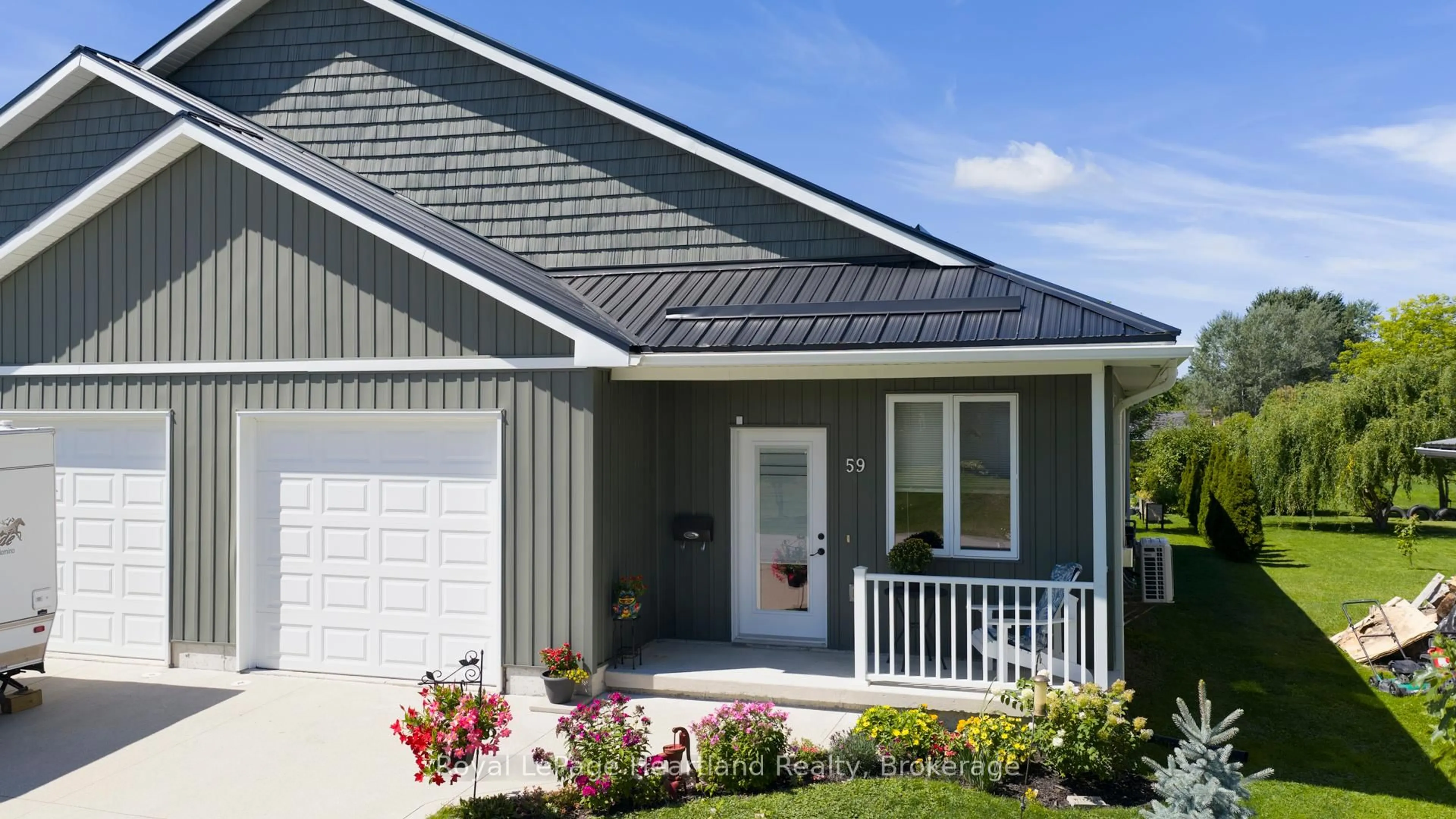 Home with vinyl exterior material, street for 59 Louisa St, Huron East Ontario N0K 1W0
