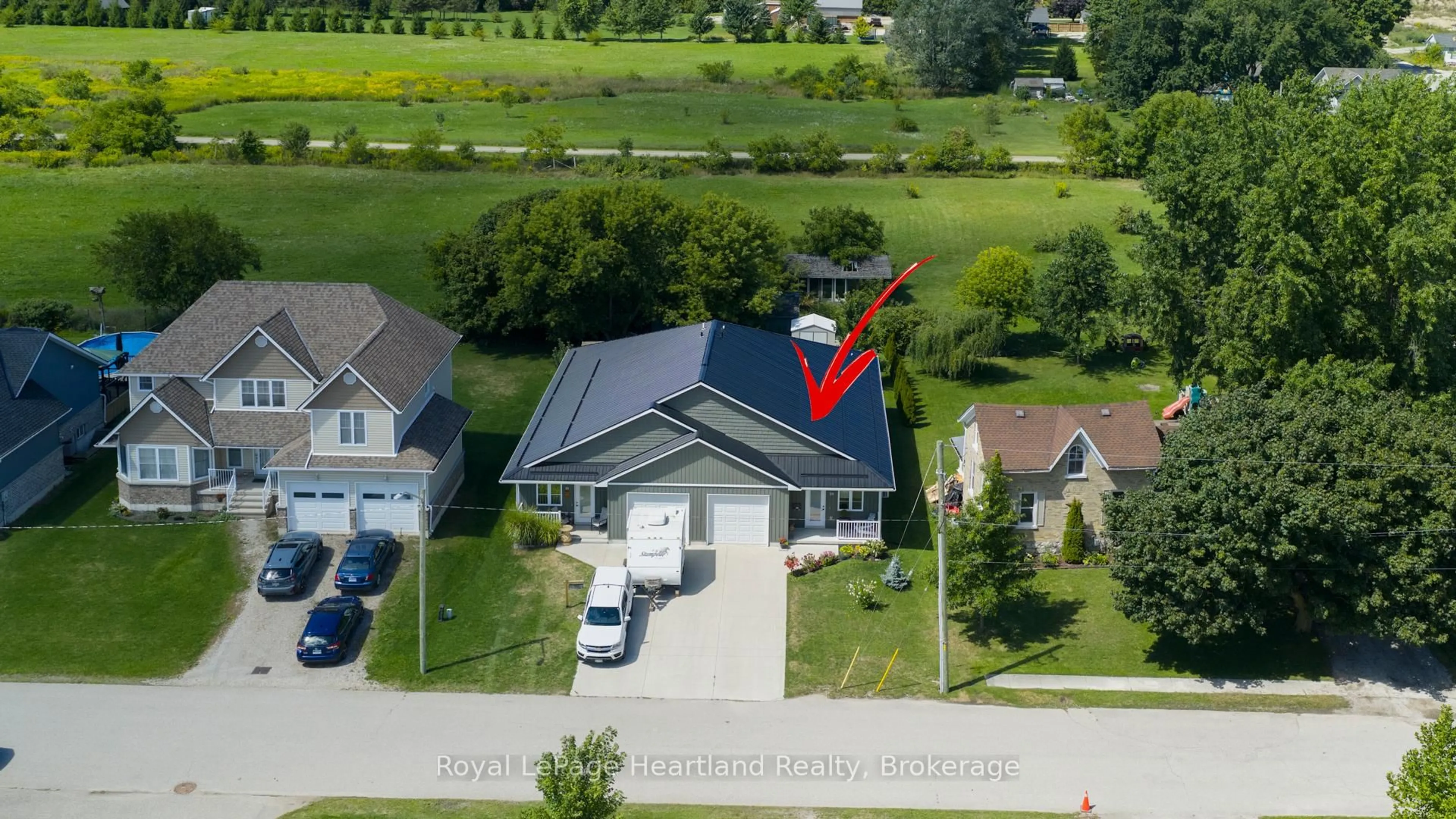 A pic from outside/outdoor area/front of a property/back of a property/a pic from drone, unknown for 59 Louisa St, Huron East Ontario N0K 1W0