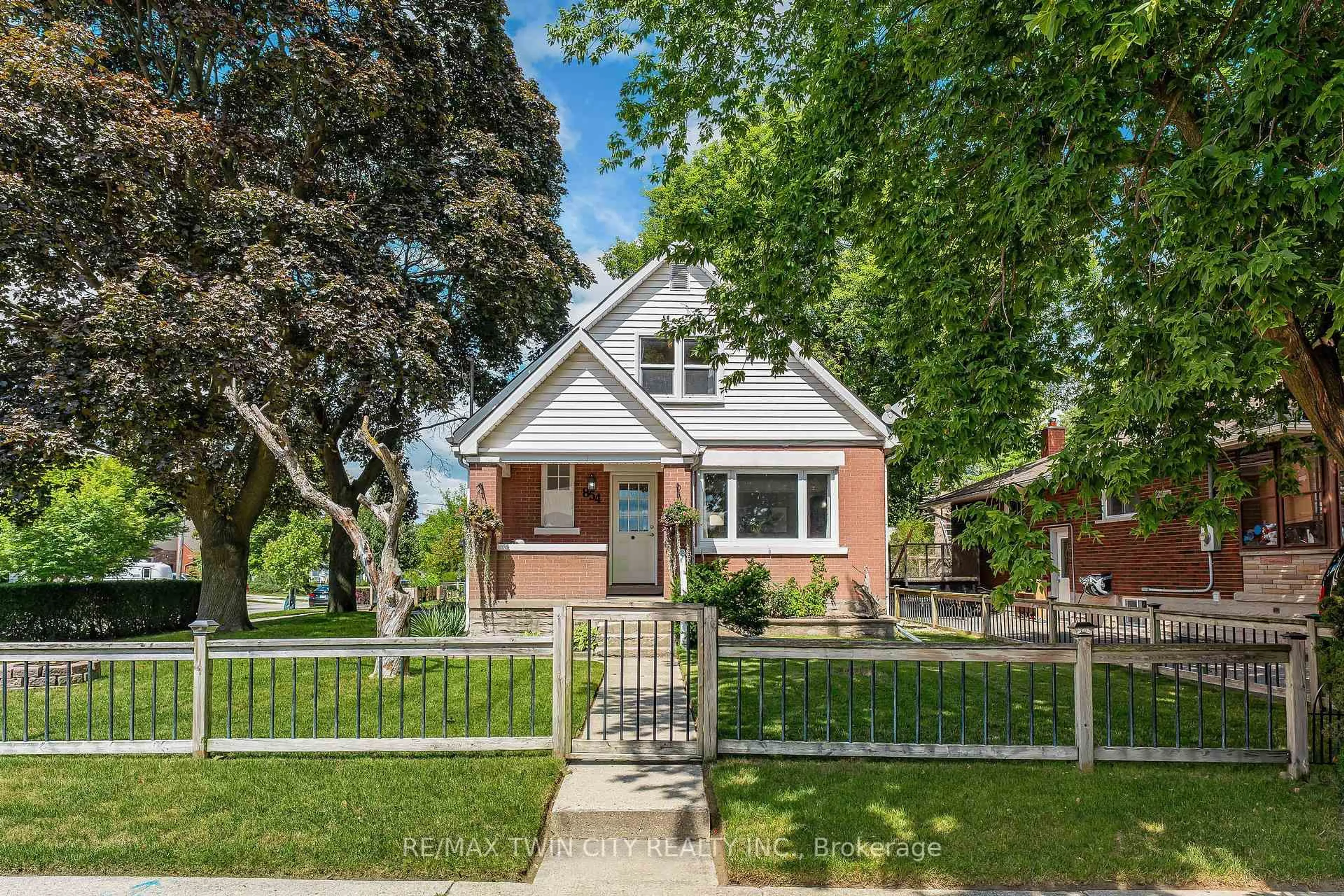 Home with brick exterior material, street for 854 Guelph St, Kitchener Ontario N2H 5Z5