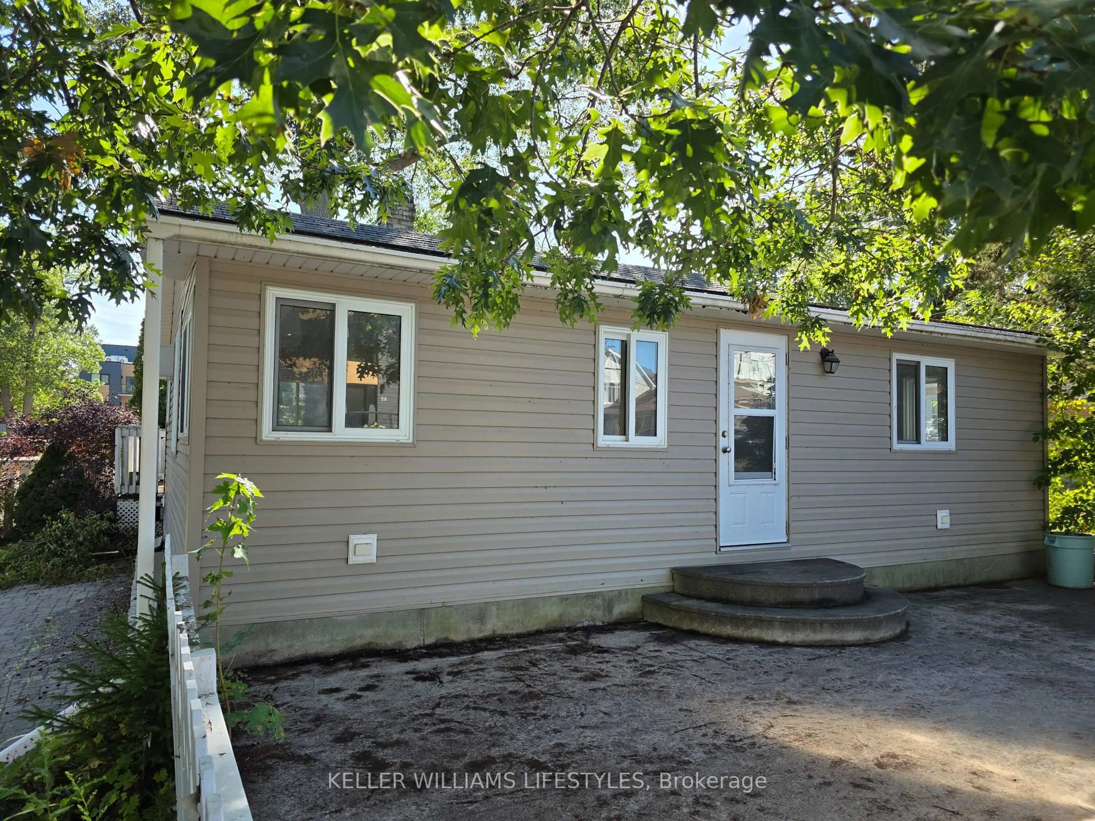 Home with vinyl exterior material, street for 58 Centre St, Lambton Shores Ontario N0M 1T0