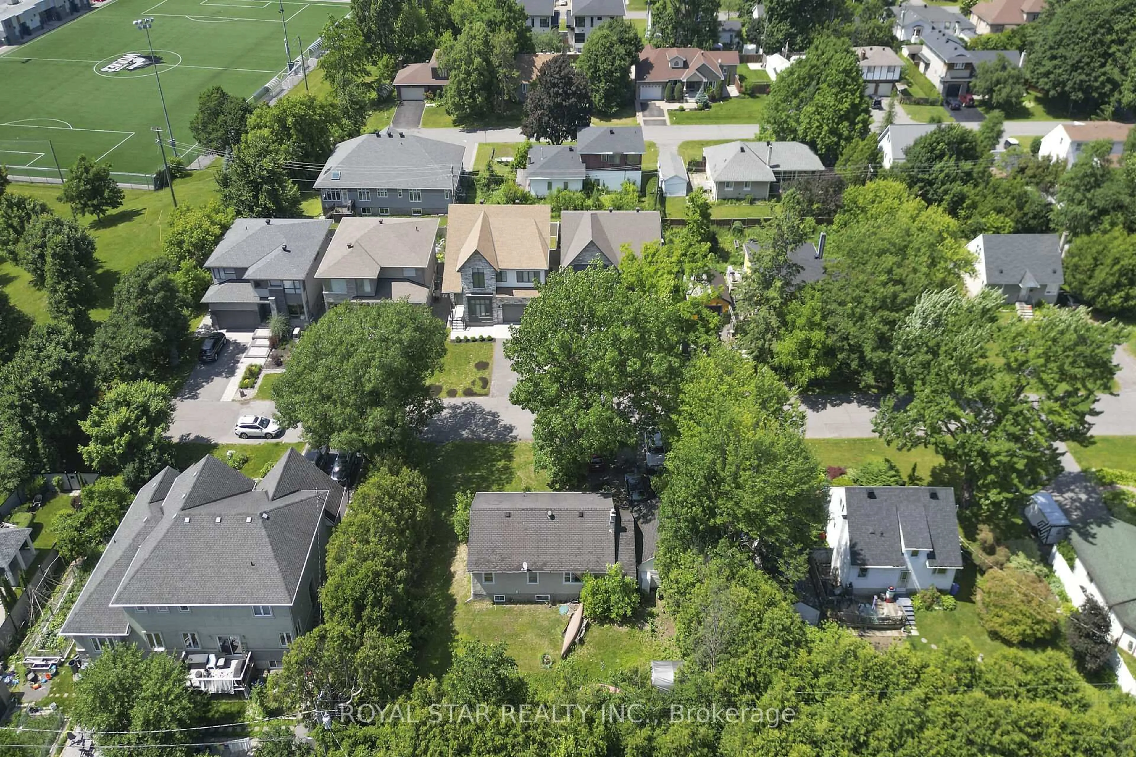 A pic from outside/outdoor area/front of a property/back of a property/a pic from drone, street for 114 Tower Rd, Ottawa Ontario K2G 2G2