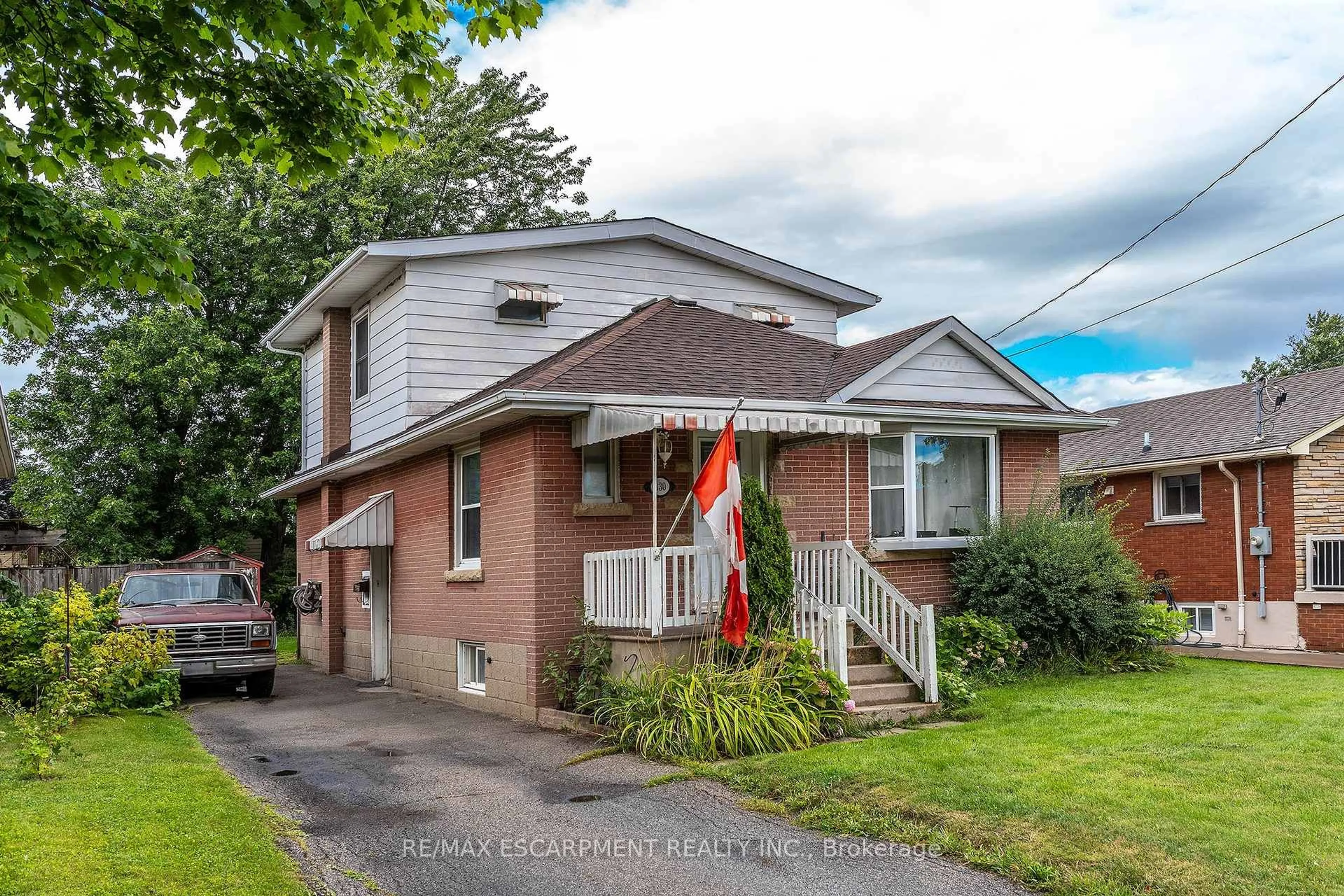 Home with brick exterior material, street for 330 East 15th St, Hamilton Ontario L9A 4G5