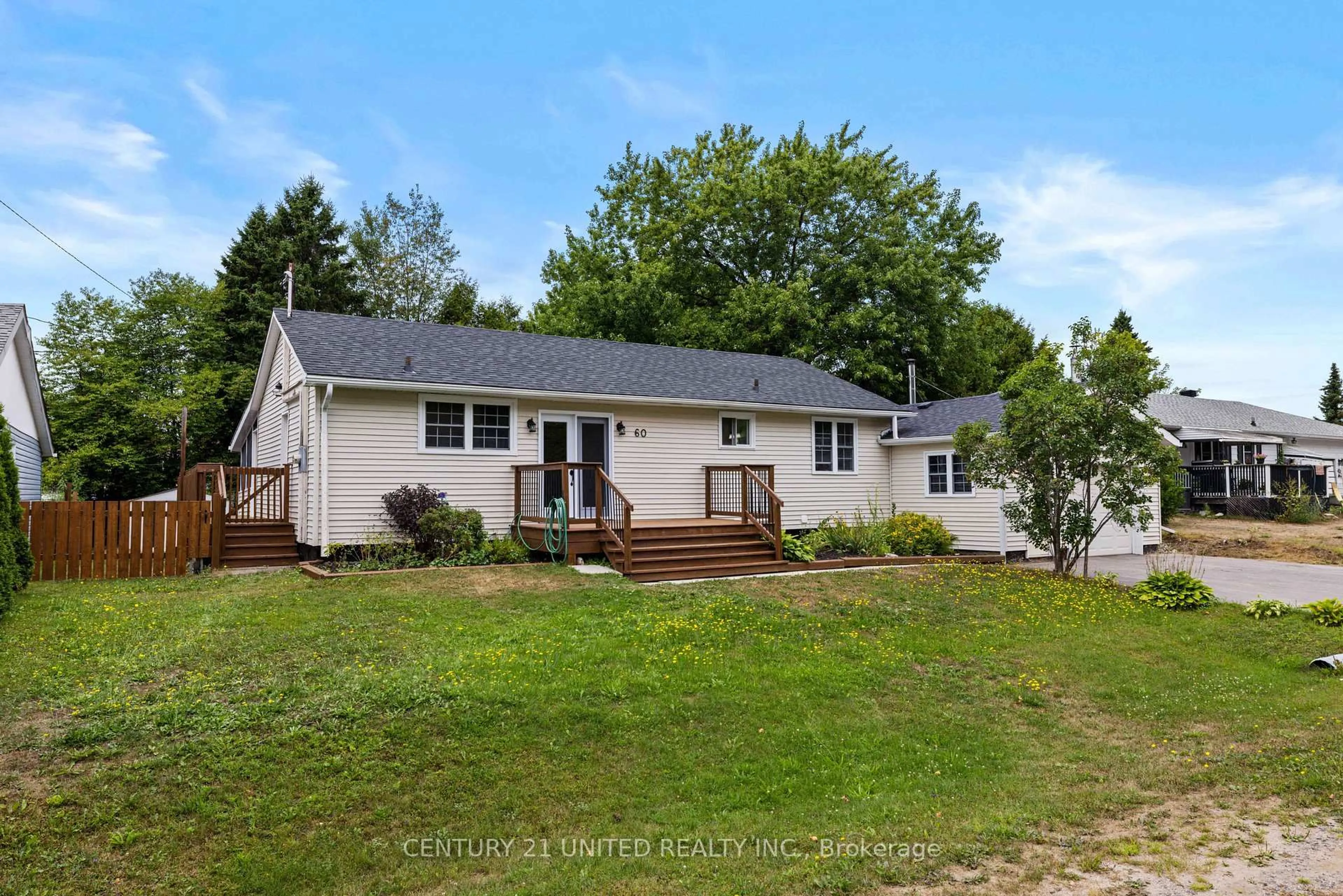 Home with vinyl exterior material, street for 60 Hemlock St, Highlands East Ontario K0L 1M0