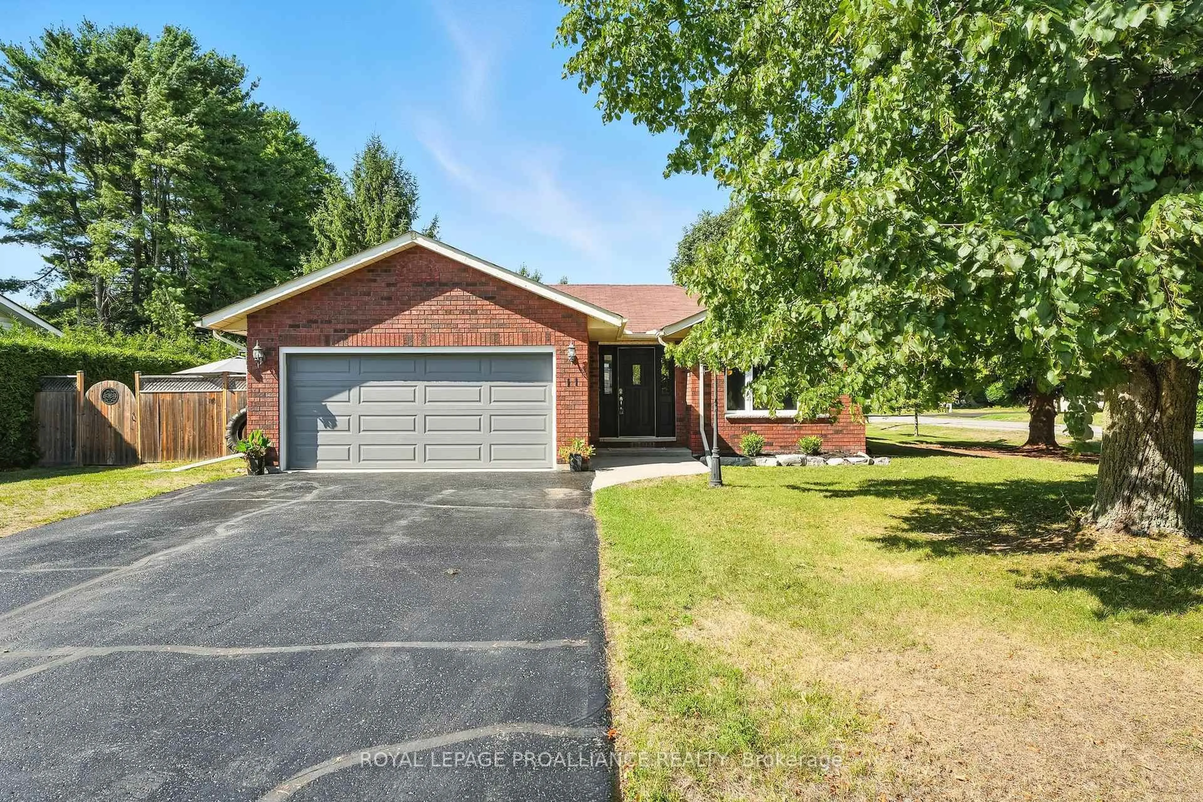 Home with brick exterior material, street for 11 Iroquois Ave, Brighton Ontario K0K 1H0