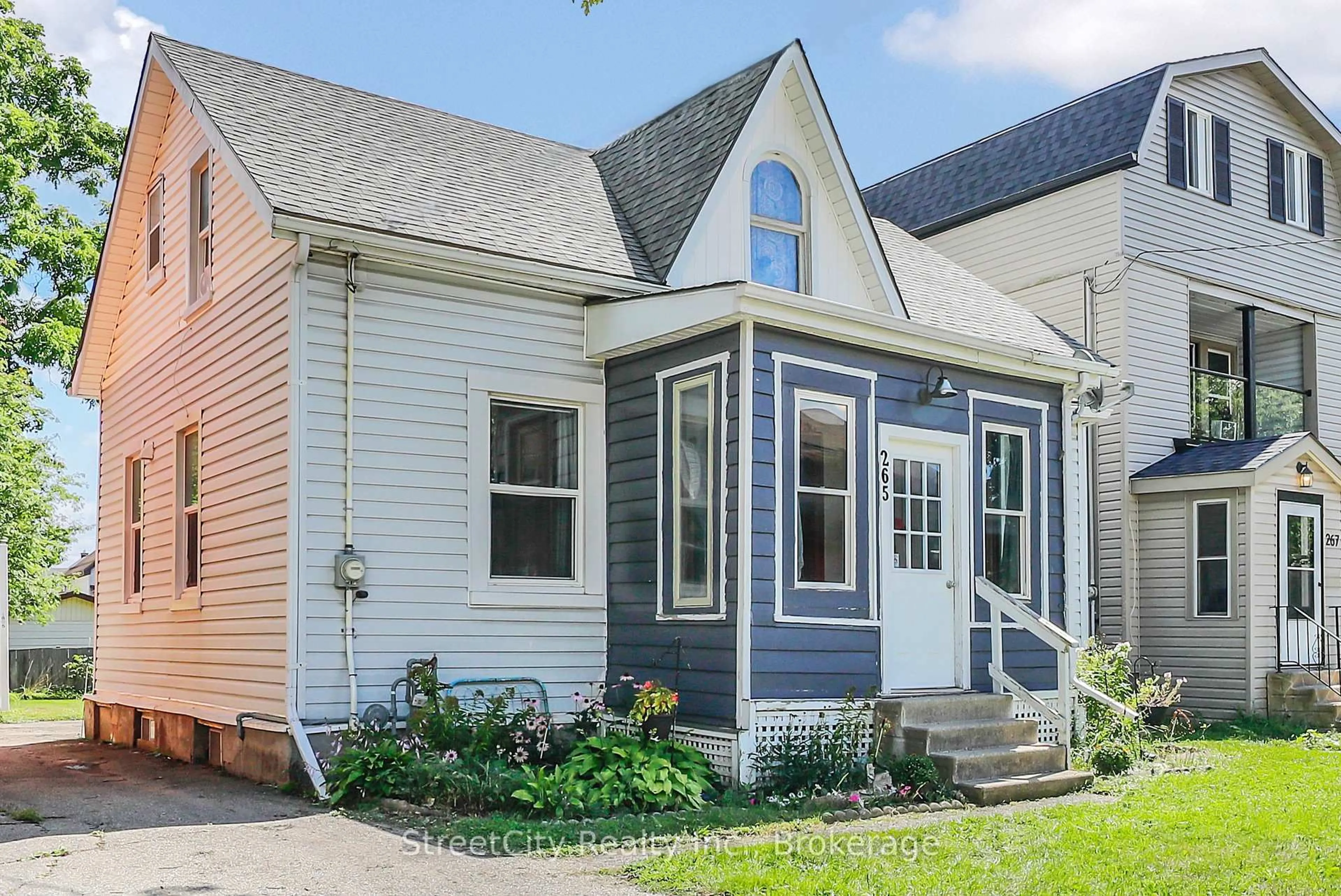 Home with vinyl exterior material, street for 265 Front St, Stratford Ontario N5A 4J1