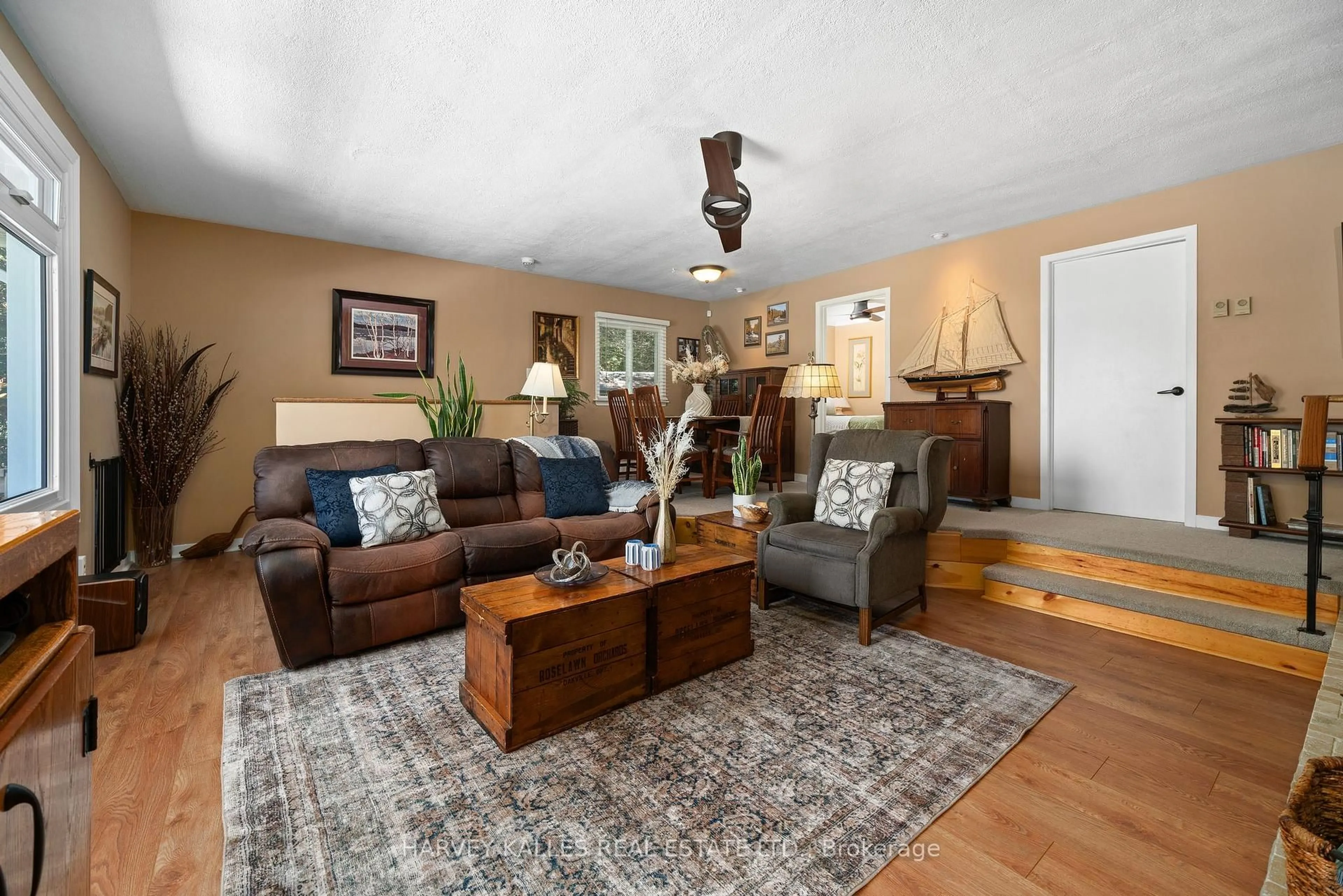 Living room with furniture, wood/laminate floor for 29 Back Lane, Prince Edward County Ontario K0K 2P0