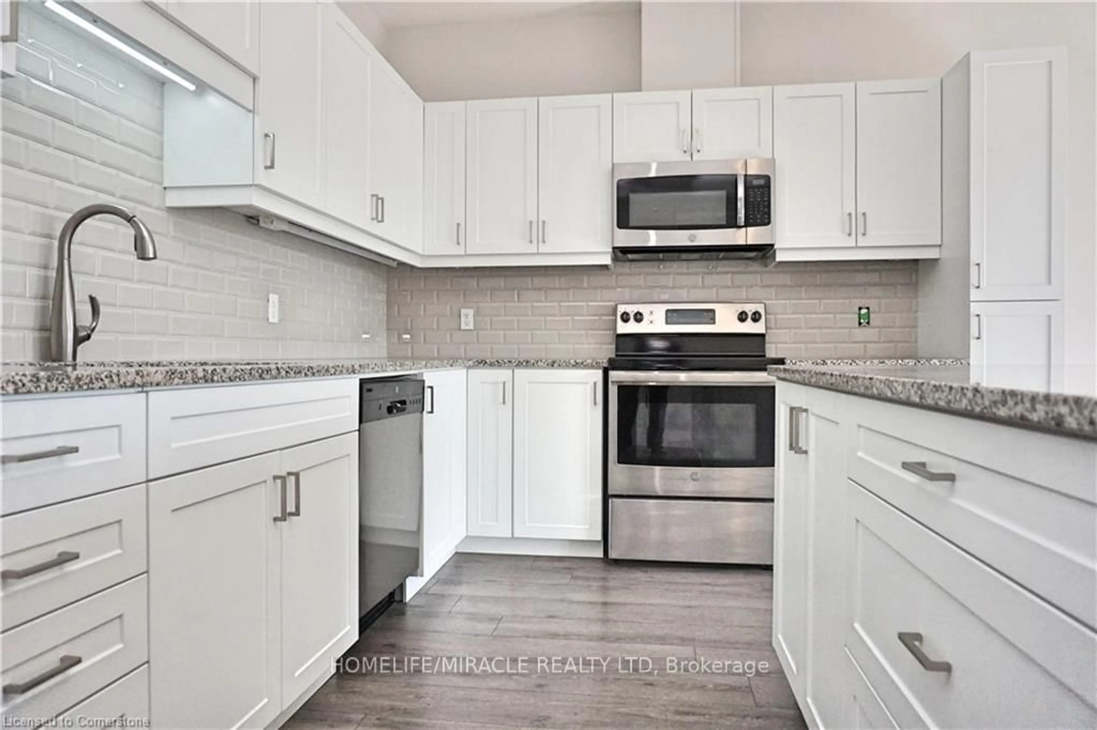 Standard kitchen, ceramic/tile floor for 12 Waterthrush Lane, Haldimand Ontario N3Y 0E9