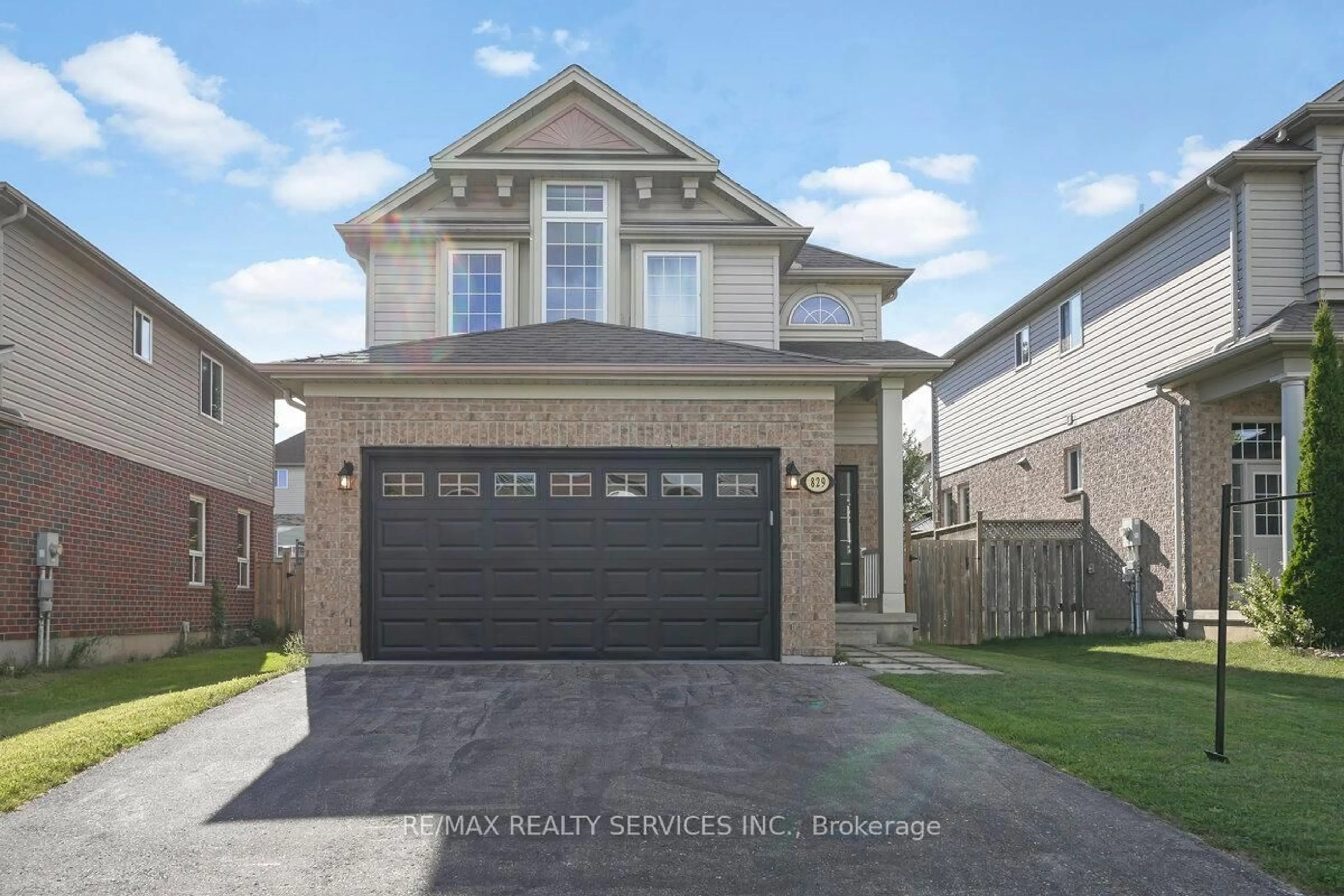 Home with brick exterior material, street for 829 Oakcrossing Rd, London North Ontario N6H 0A4