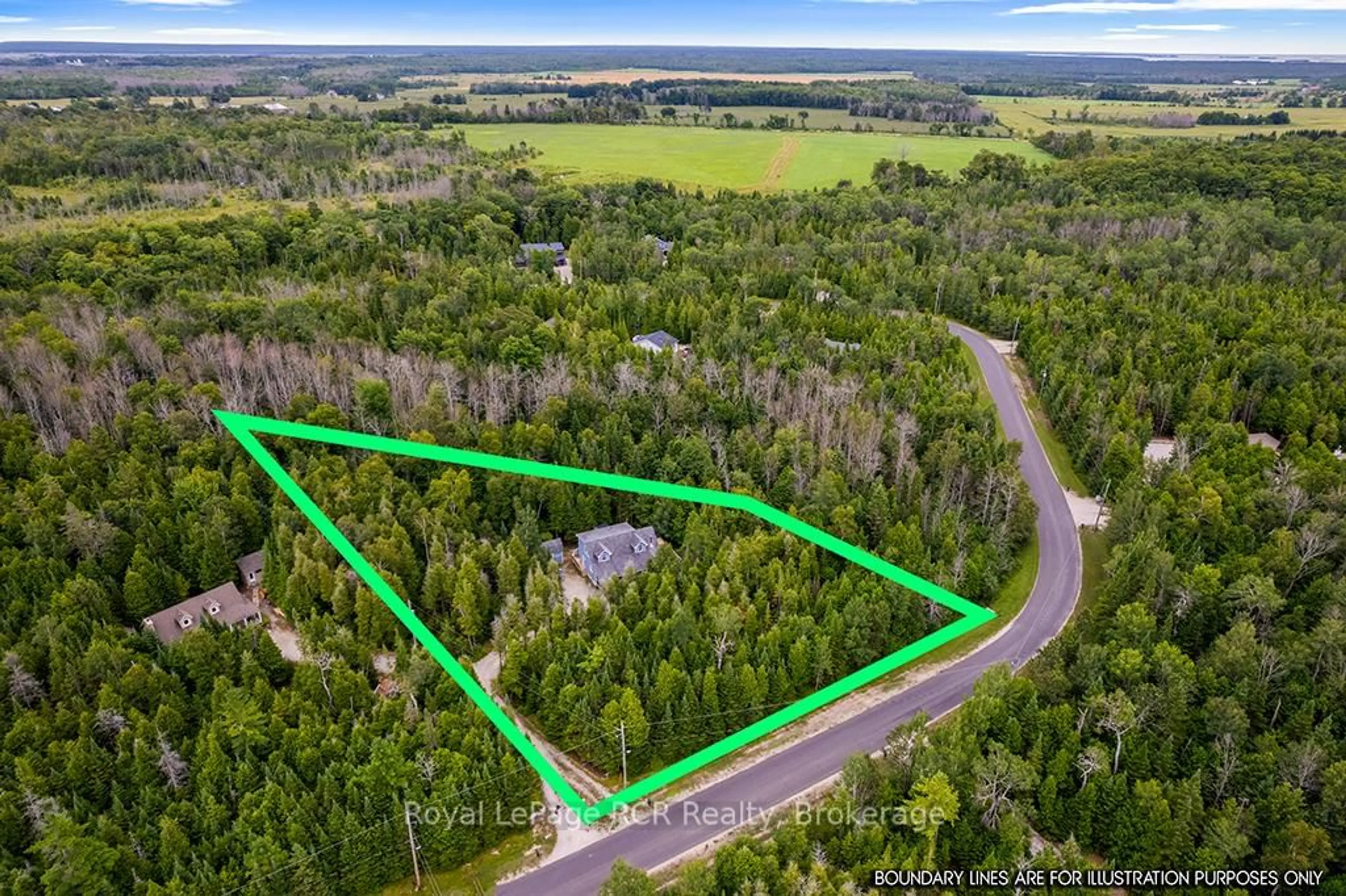 A pic from outside/outdoor area/front of a property/back of a property/a pic from drone, forest/trees view for 127 Lakewood Country Lane, Northern Bruce Peninsula Ontario N0H 1W0