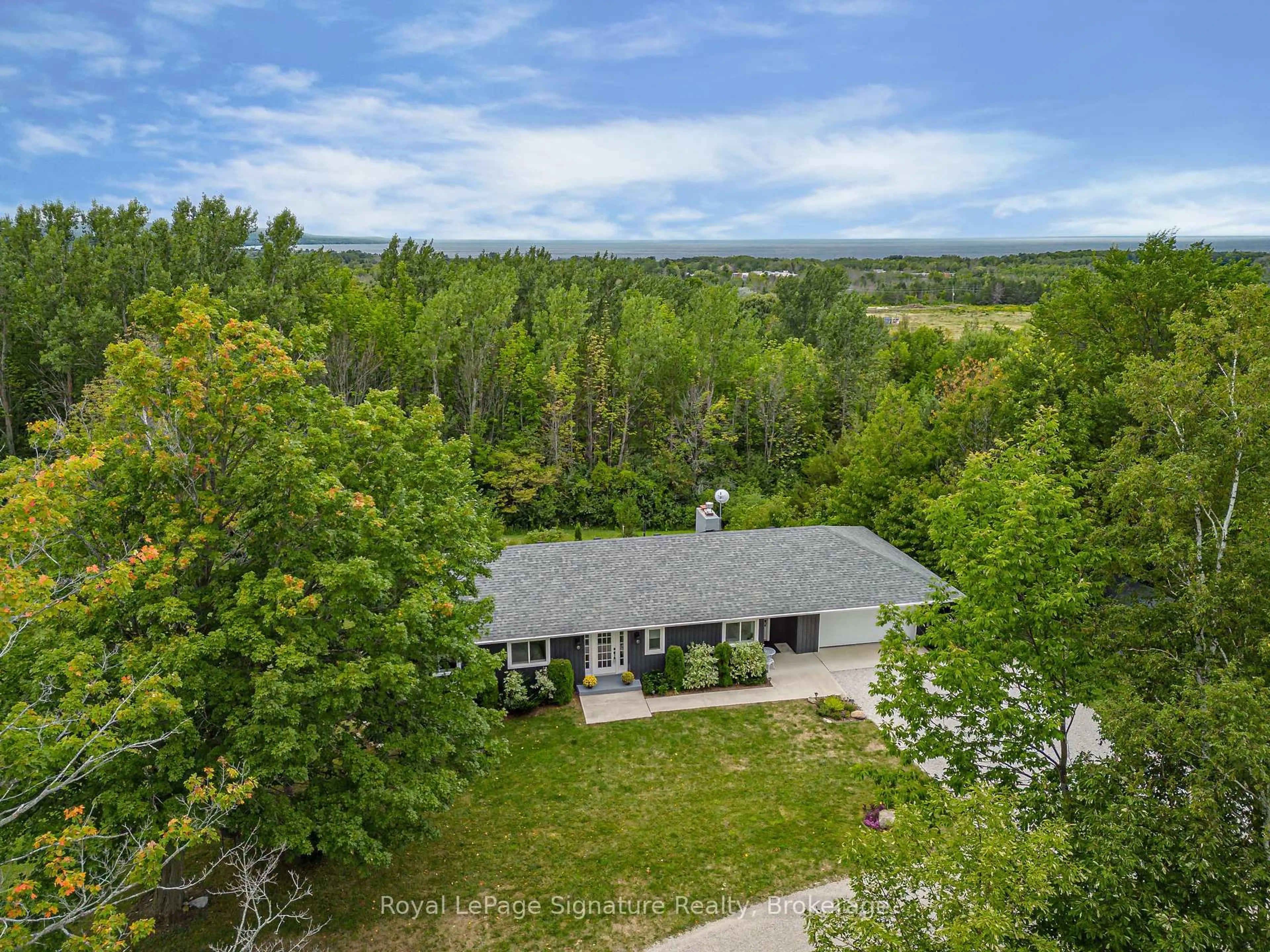 A pic from outside/outdoor area/front of a property/back of a property/a pic from drone, forest/trees view for 197702 GREY ROAD 7, Meaford Ontario N4L 1W7