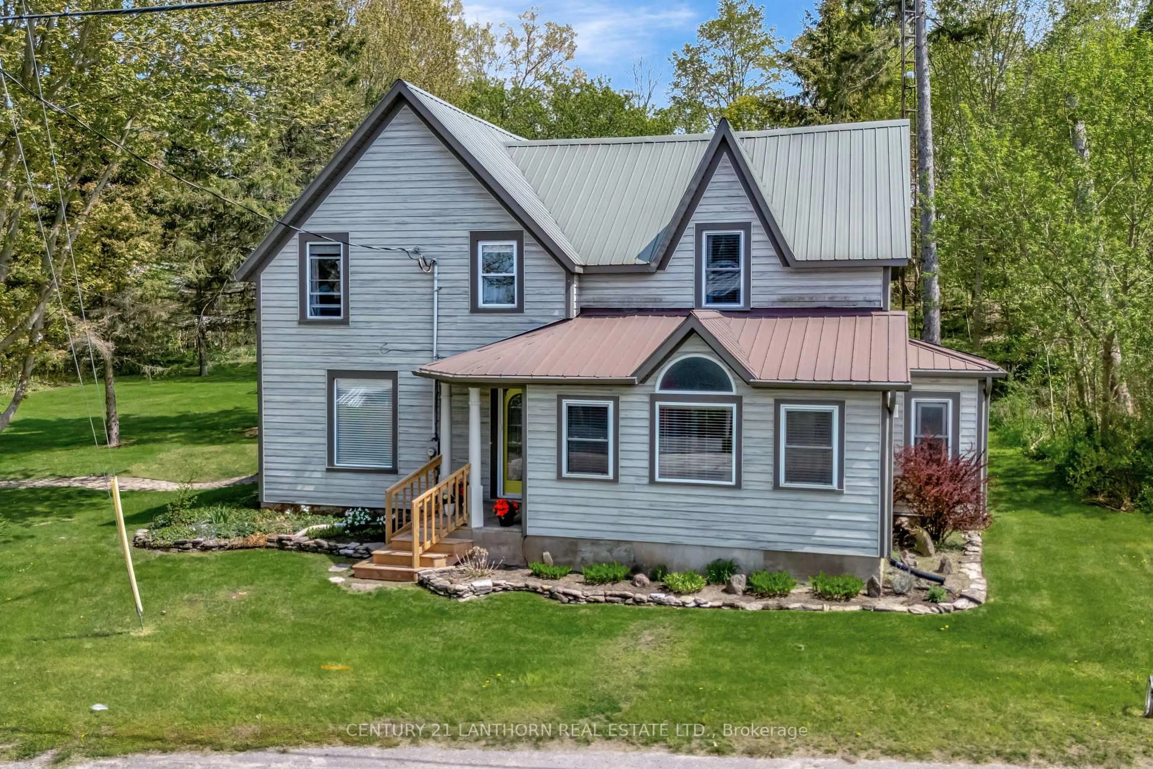 A pic from outside/outdoor area/front of a property/back of a property/a pic from drone, unknown for 1647 County 10 Rd, Prince Edward County Ontario K0K 1P0