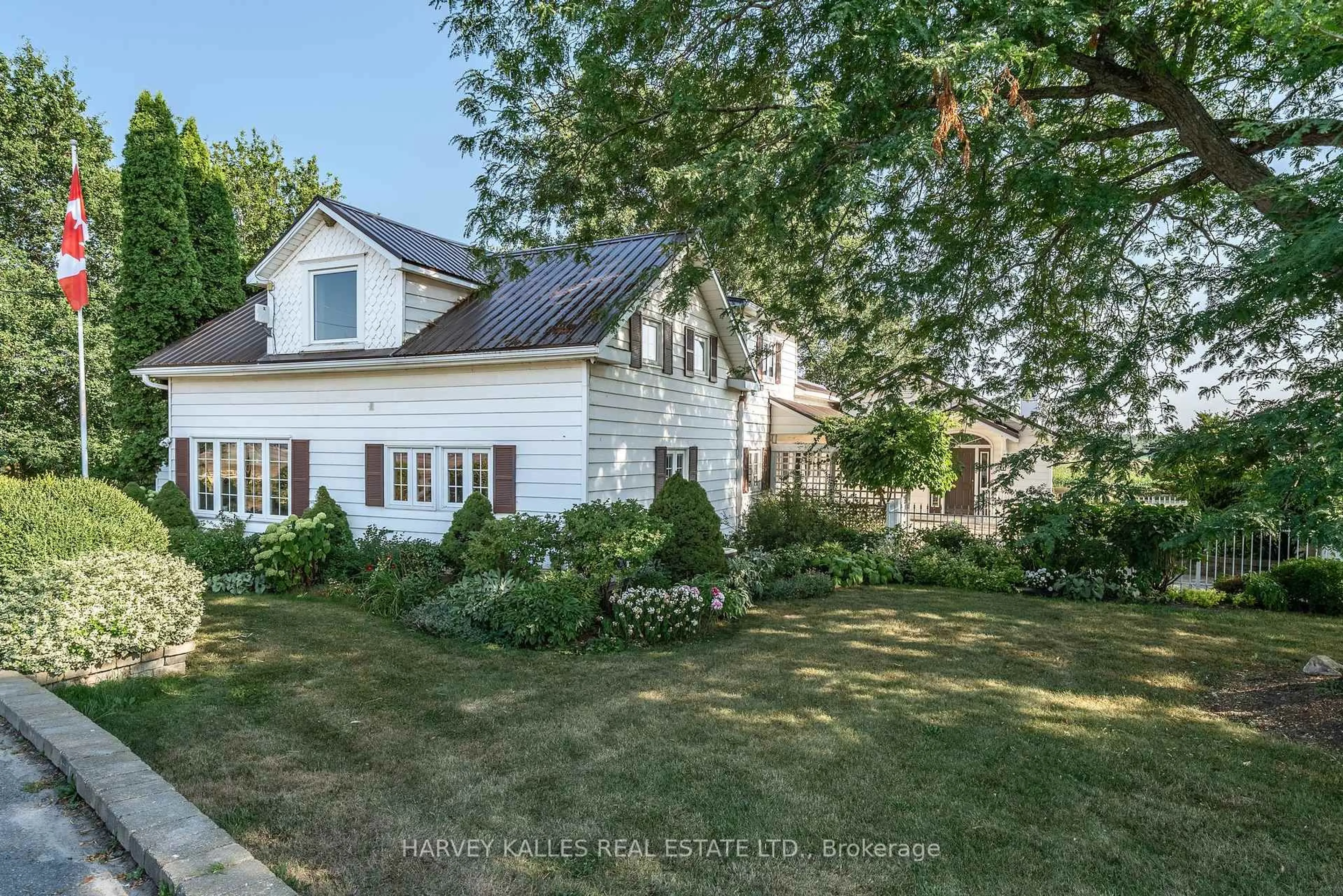 A pic from outside/outdoor area/front of a property/back of a property/a pic from drone, street for 13667 Loyalist Pkwy, Prince Edward County Ontario K0K 2T0