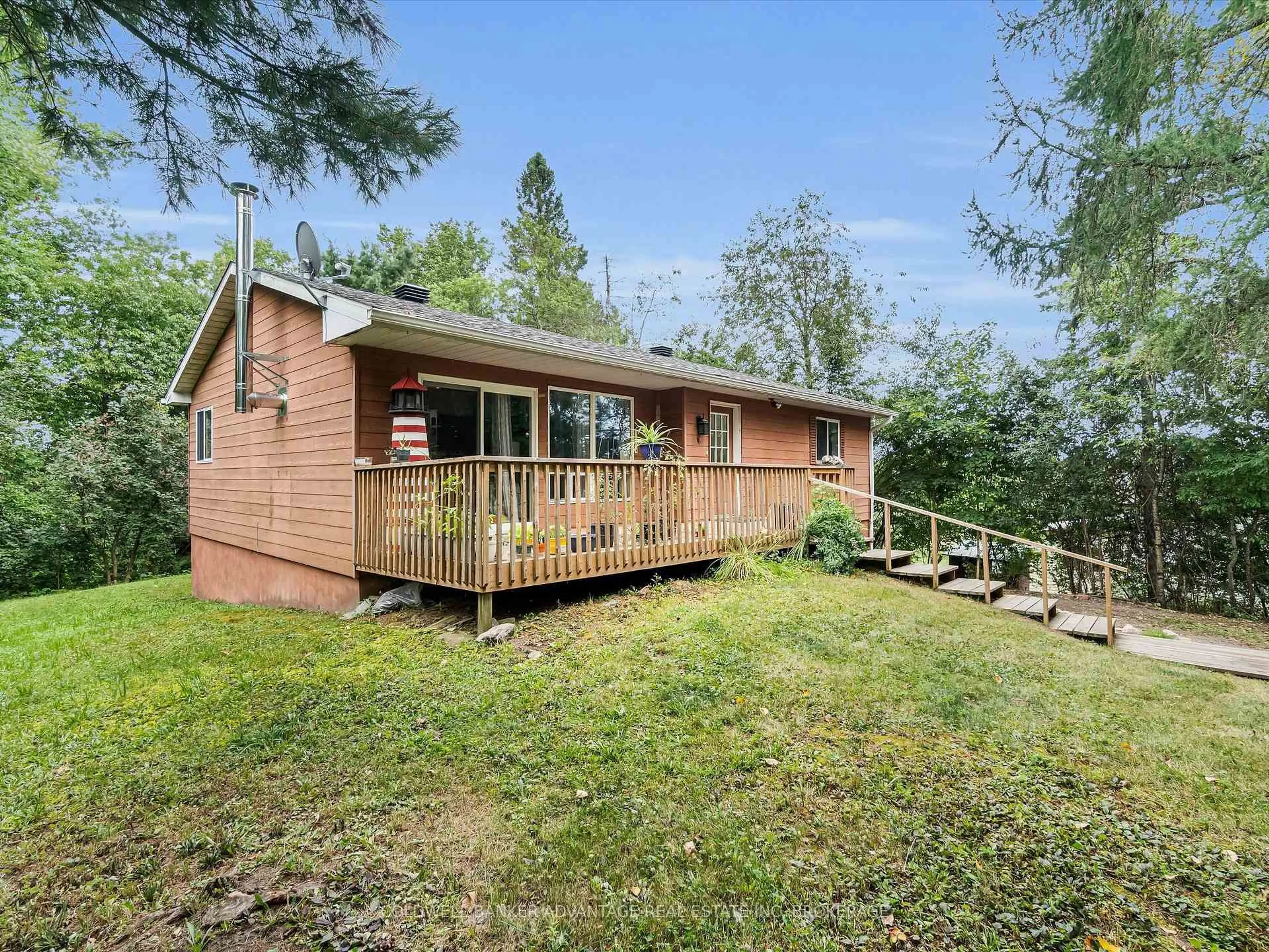 A pic from outside/outdoor area/front of a property/back of a property/a pic from drone, unknown for 4276 HIGHWAY 520, Magnetawan Ontario P0A 1P0