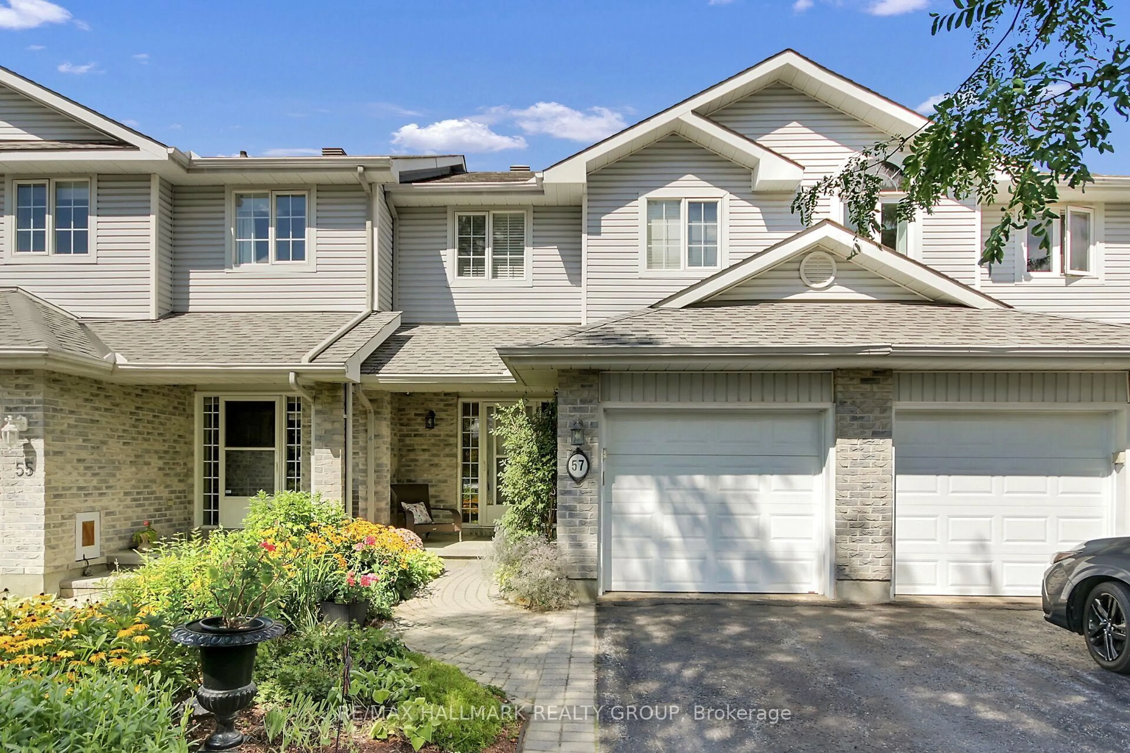 Home with brick exterior material, street for 57 Windcrest Crt, Ottawa Ontario K2T 1B5