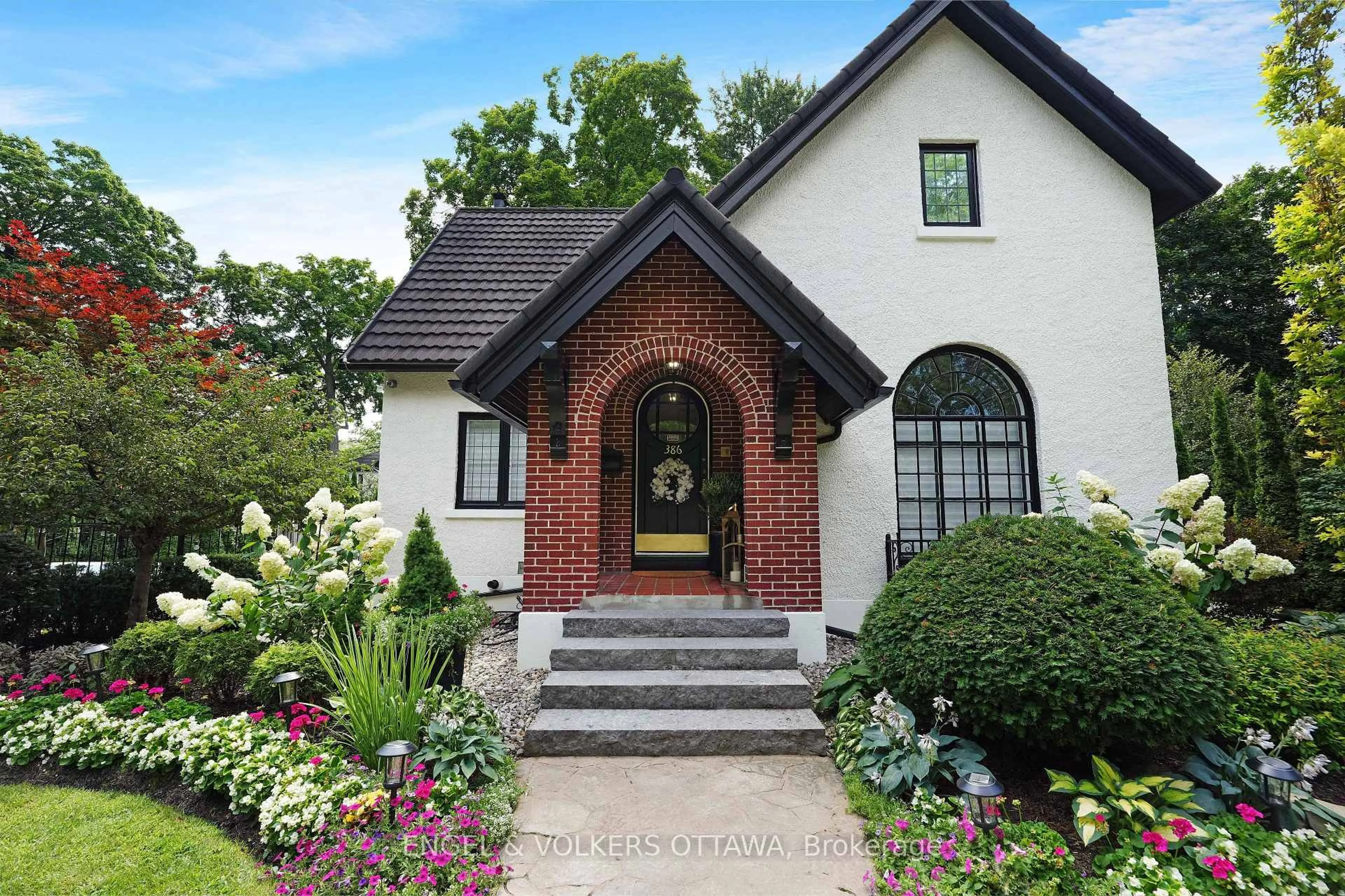 Home with brick exterior material, street for 386 Ashbury Rd, Ottawa Ontario K1M 0R8