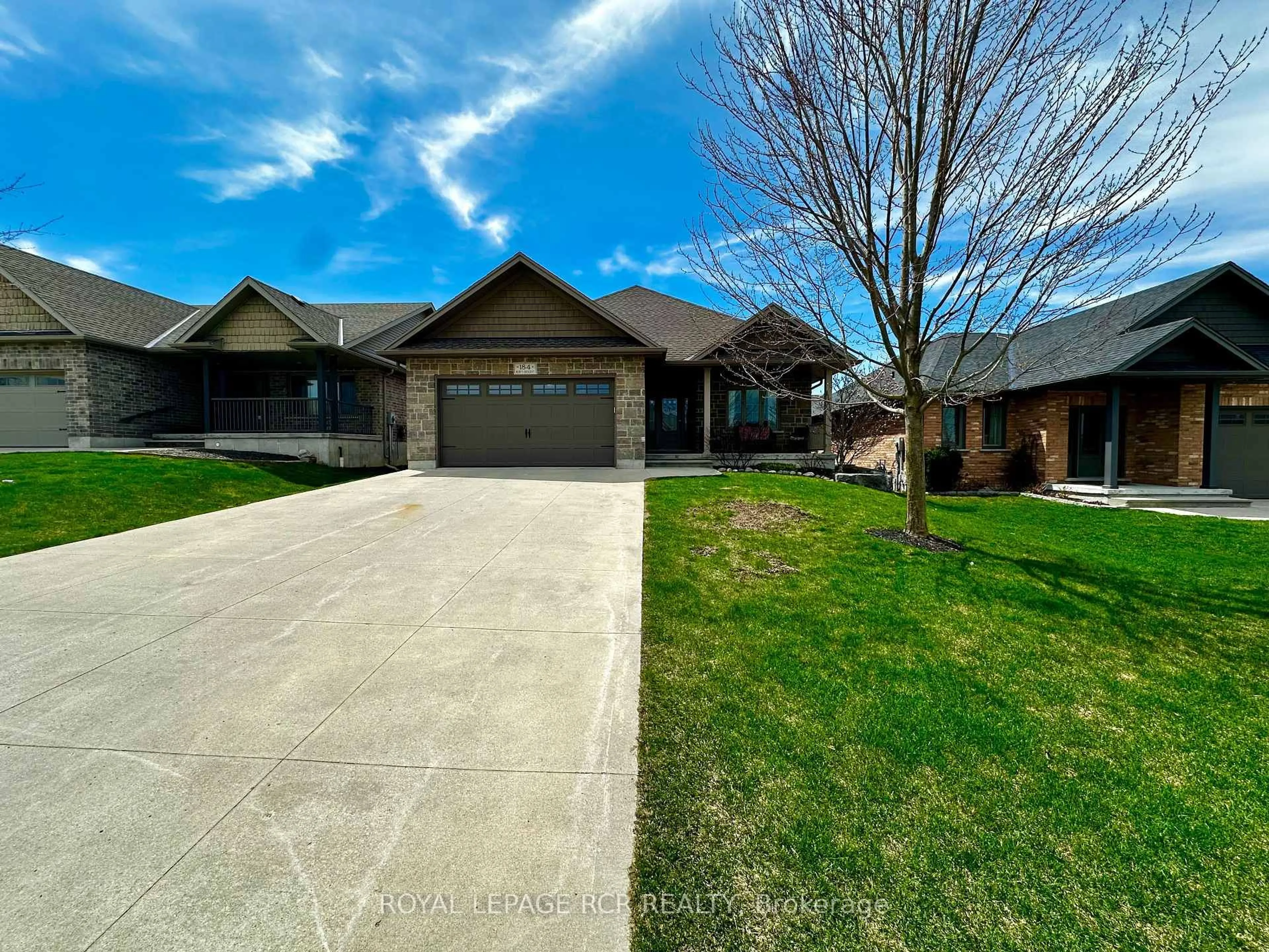 A pic from outside/outdoor area/front of a property/back of a property/a pic from drone, street for 184 Ruby's Cres, Wellington North Ontario N0G 2L2