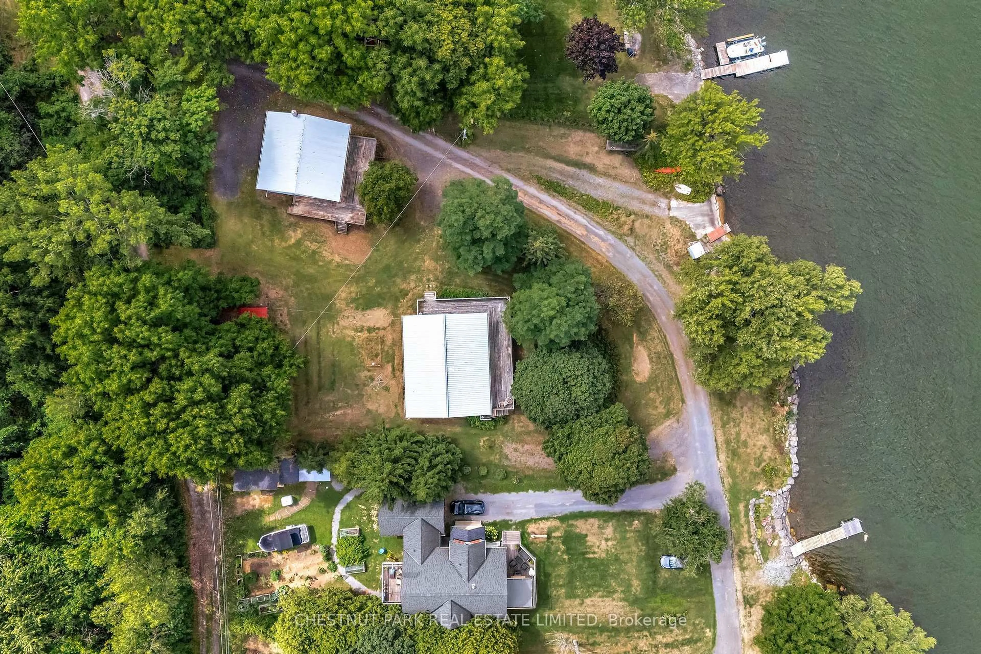 A pic from outside/outdoor area/front of a property/back of a property/a pic from drone, water/lake/river/ocean view for 84-88 Munroe Lane, Prince Edward County Ontario K0K 2T0
