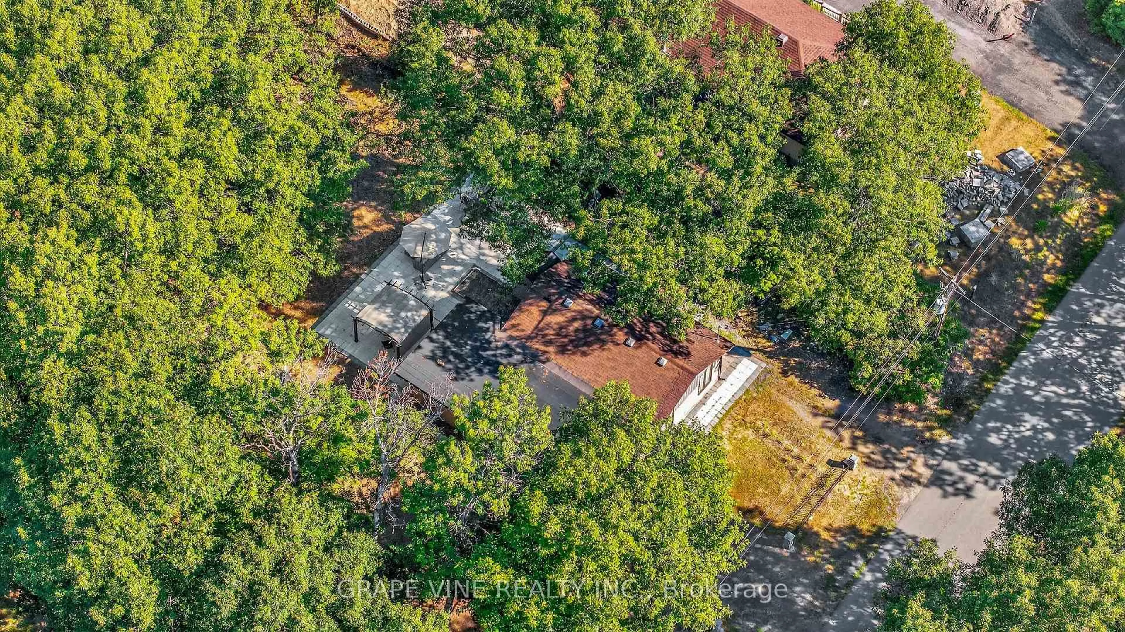 A pic from outside/outdoor area/front of a property/back of a property/a pic from drone, forest/trees view for 125 Hunter Cres, Ottawa Ontario K0A 3M0