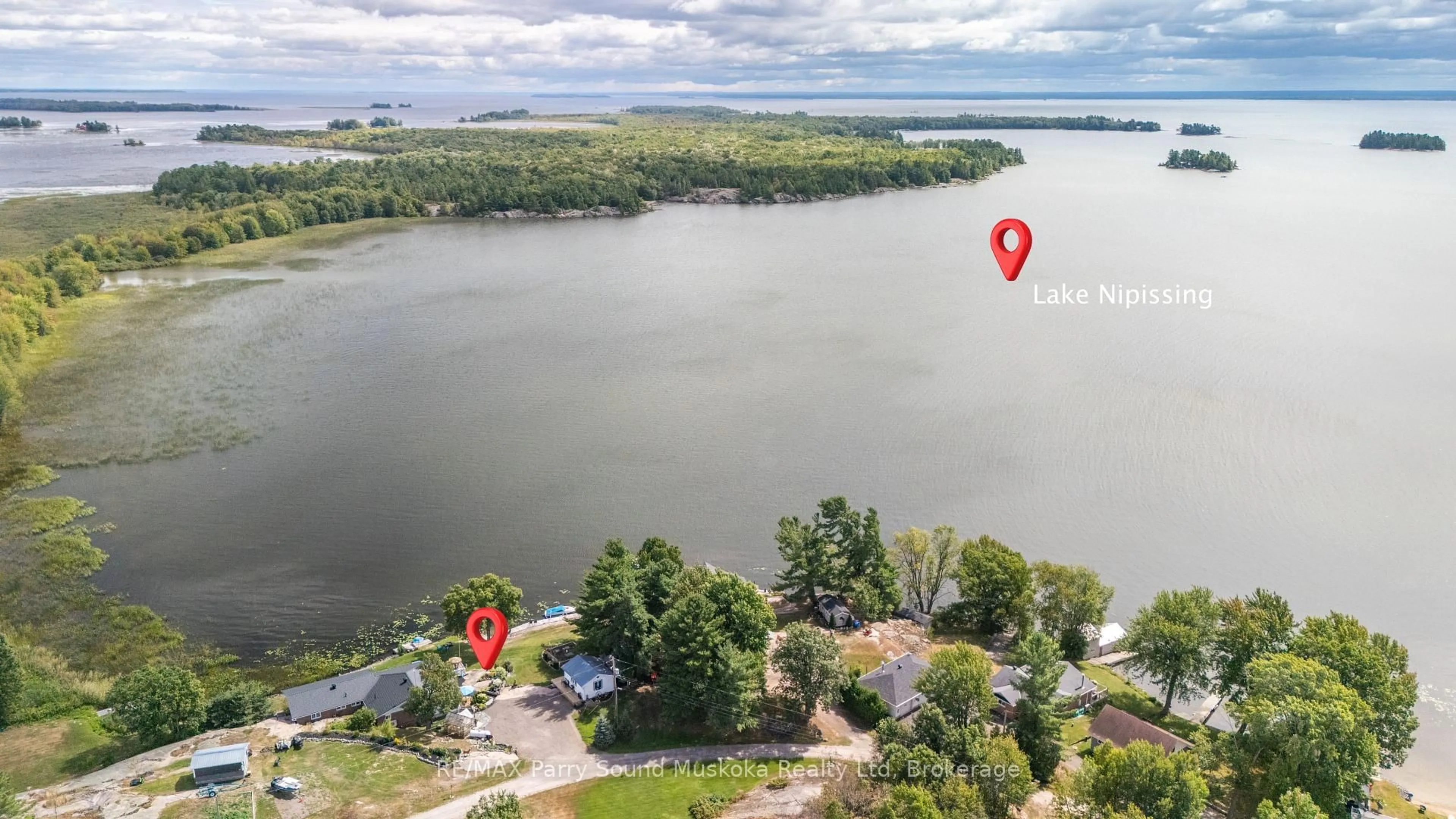 A pic from outside/outdoor area/front of a property/back of a property/a pic from drone, water/lake/river/ocean view for 38 Fortin Dr, West Nipissing Ontario P0H 2M0