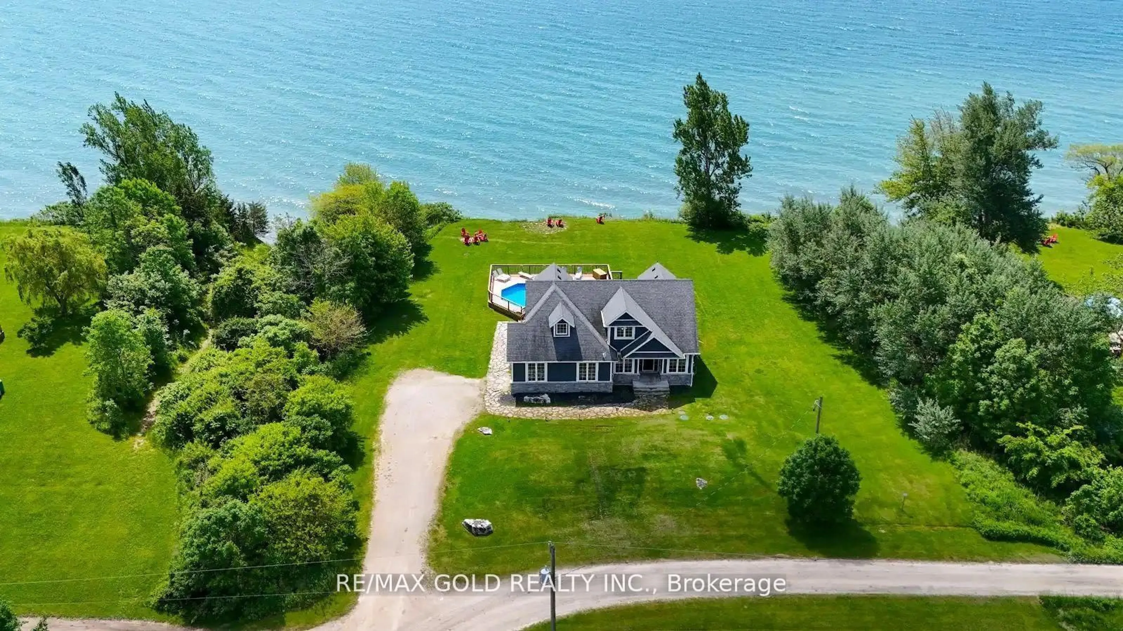 A pic from outside/outdoor area/front of a property/back of a property/a pic from drone, water/lake/river/ocean view for 1932 Ocean Blvd, Chatham-Kent Ontario N0P 2P0