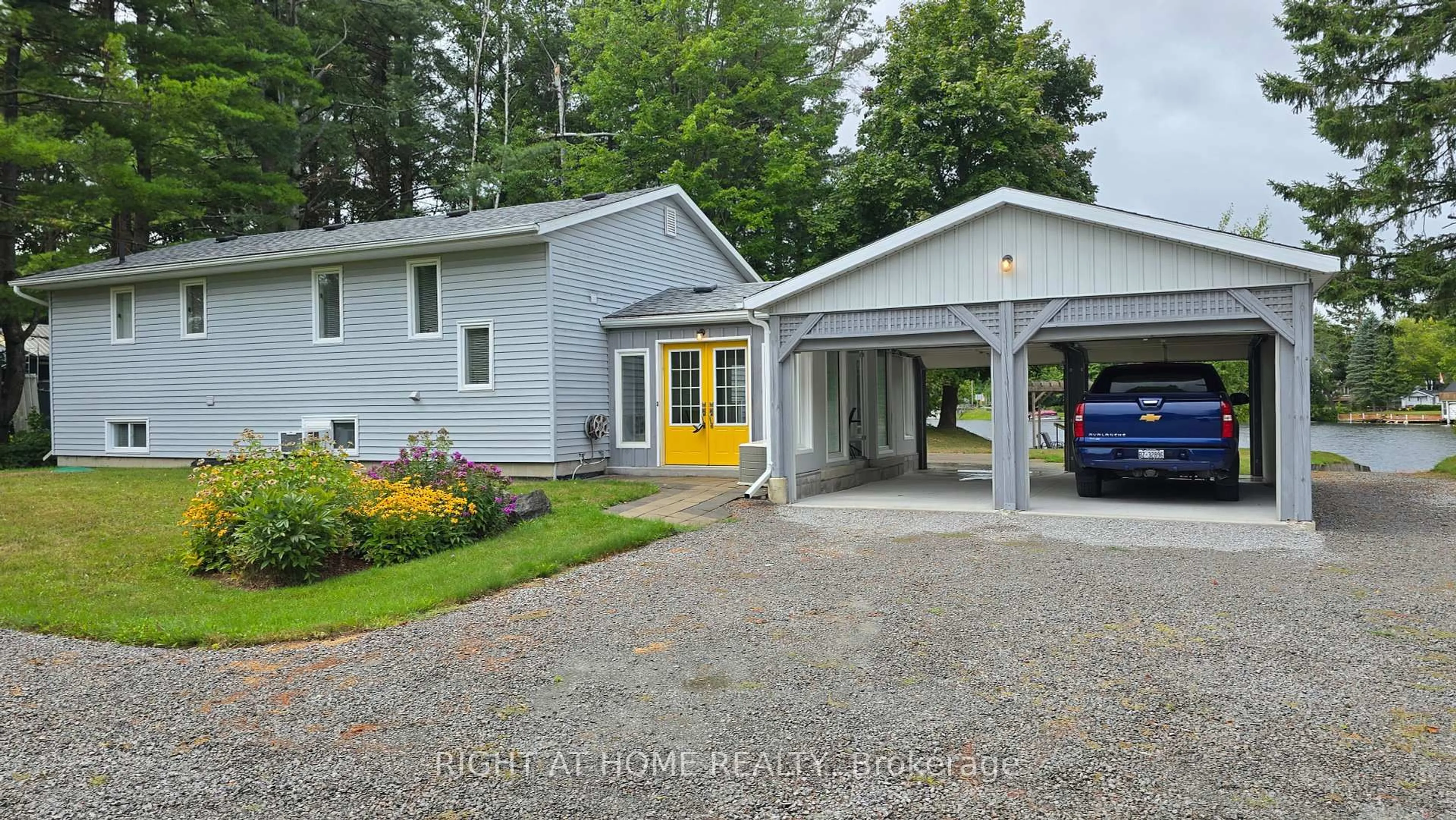 A pic from outside/outdoor area/front of a property/back of a property/a pic from drone, street for 31 Portage Rd, Kawartha Lakes Ontario K0M 2T0