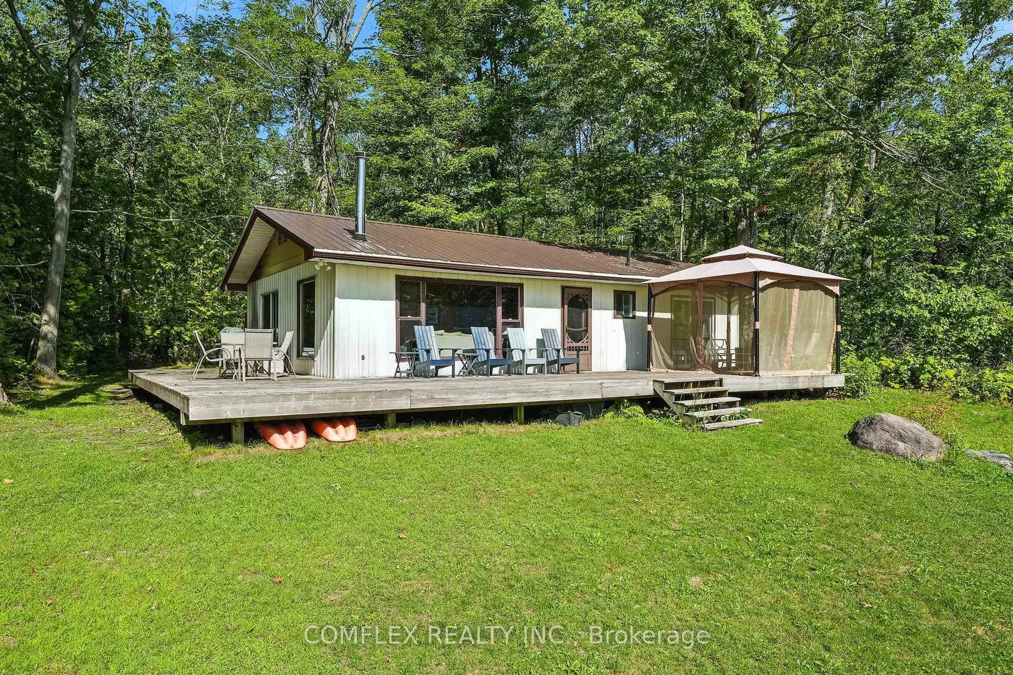 A pic from outside/outdoor area/front of a property/back of a property/a pic from drone, water/lake/river/ocean view for 633 Grand Island, Kawartha Lakes Ontario K0M 1G0