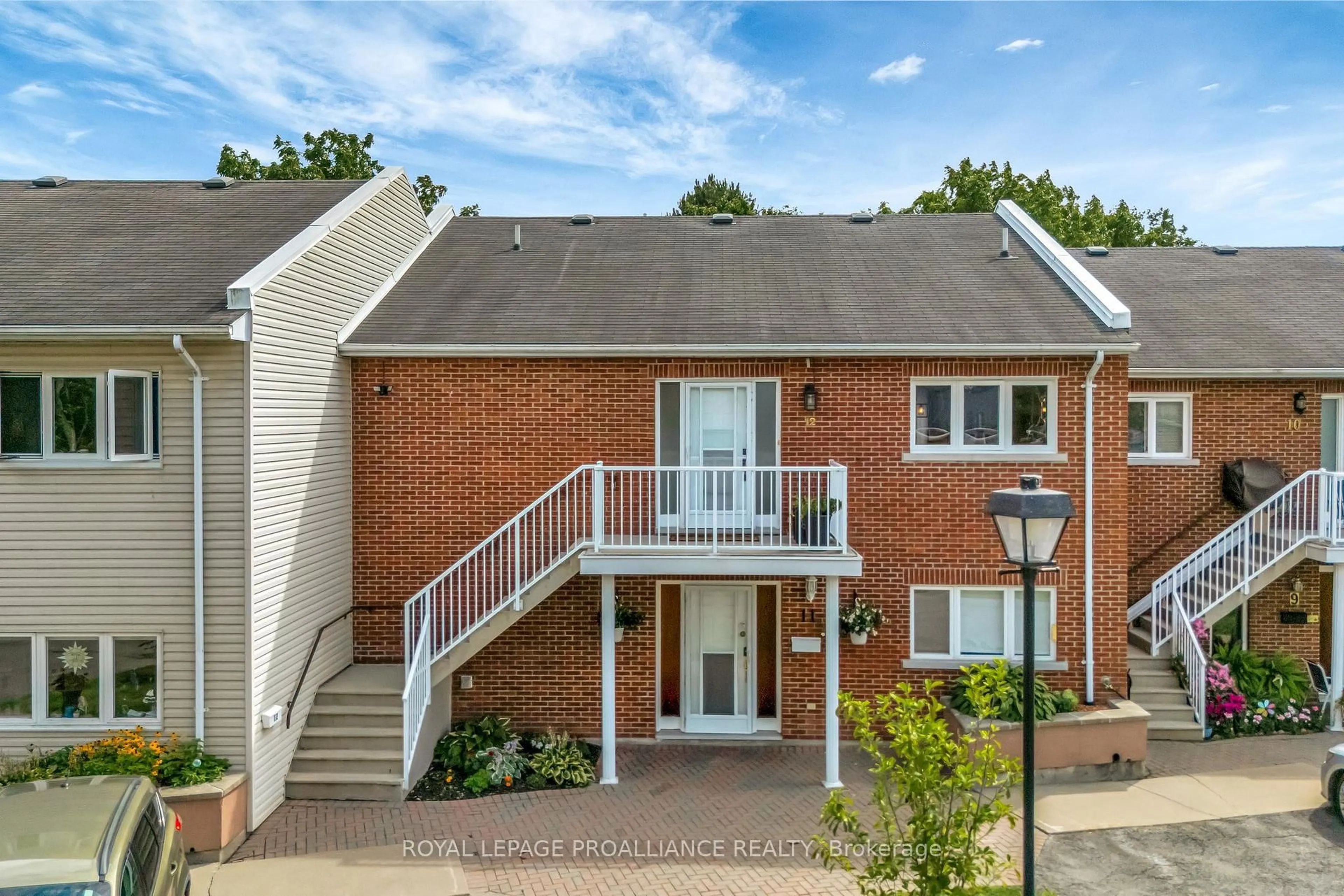 A pic from outside/outdoor area/front of a property/back of a property/a pic from drone, unknown for 179 Herchimer Ave #12, Belleville Ontario K8N 4G7