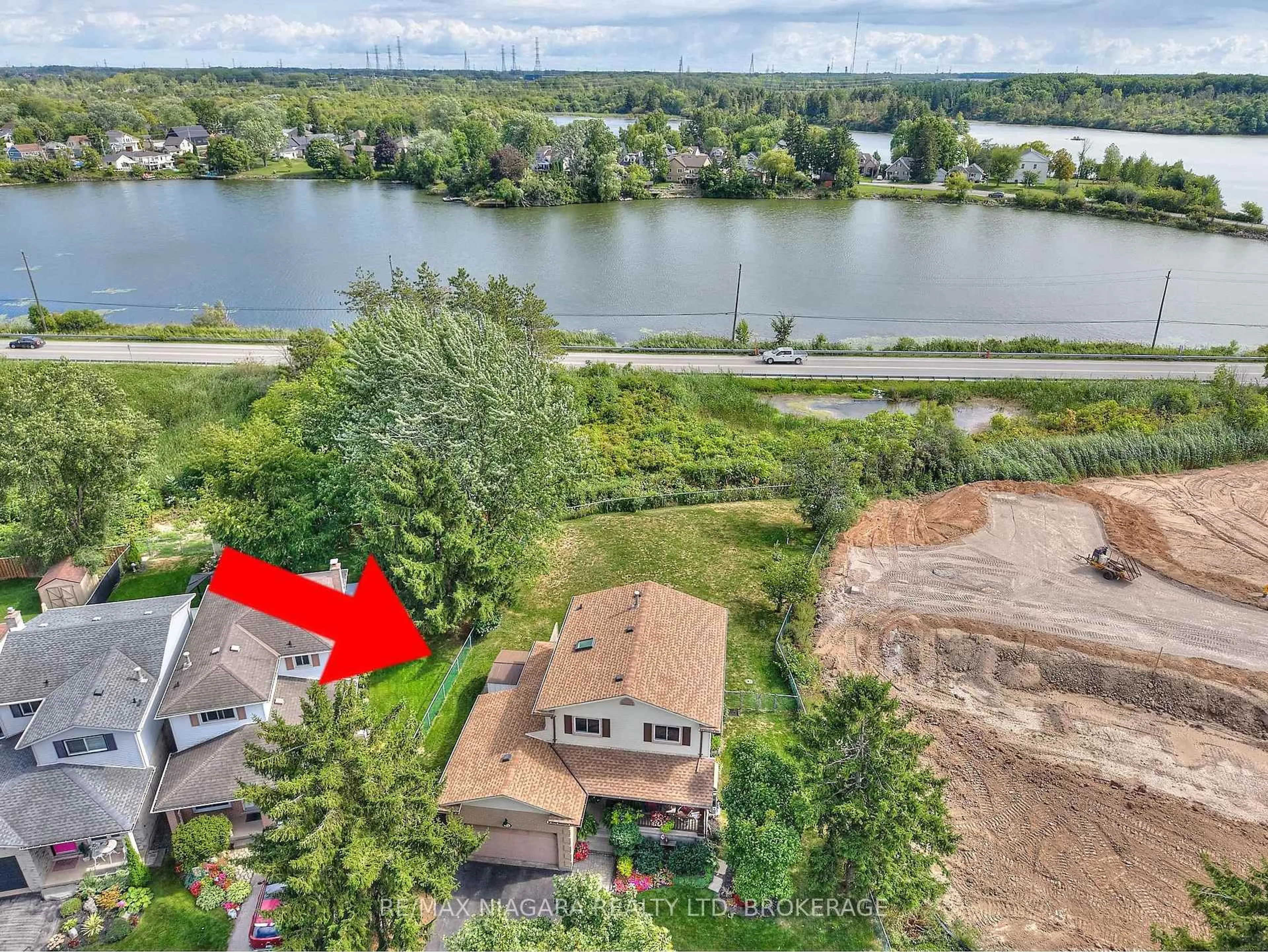 A pic from outside/outdoor area/front of a property/back of a property/a pic from drone, water/lake/river/ocean view for 12 Lampman Cres, Thorold Ontario L2V 4K7