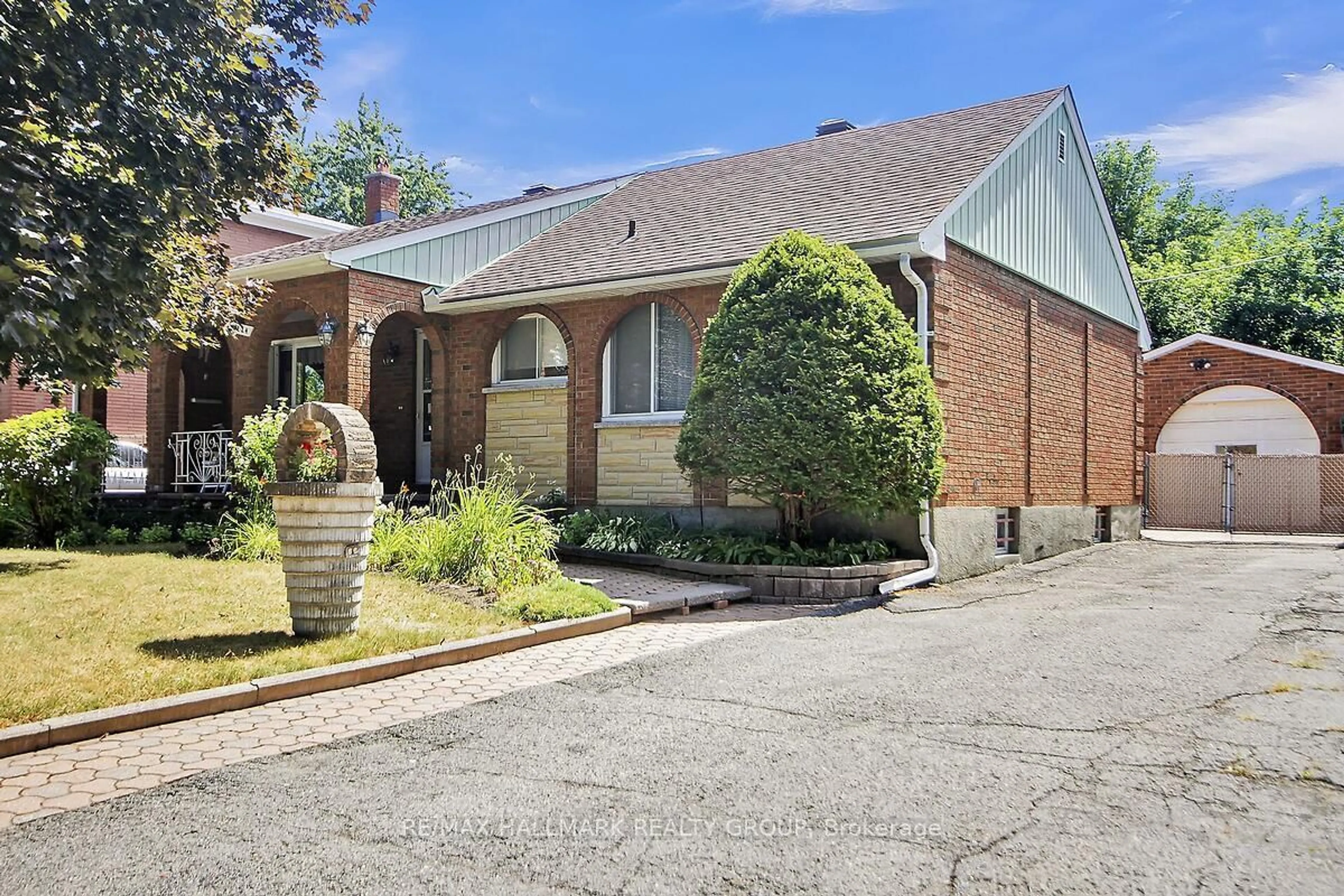 Home with brick exterior material, street for 1124 Guertin Ave, Ottawa Ontario K1H 8B6