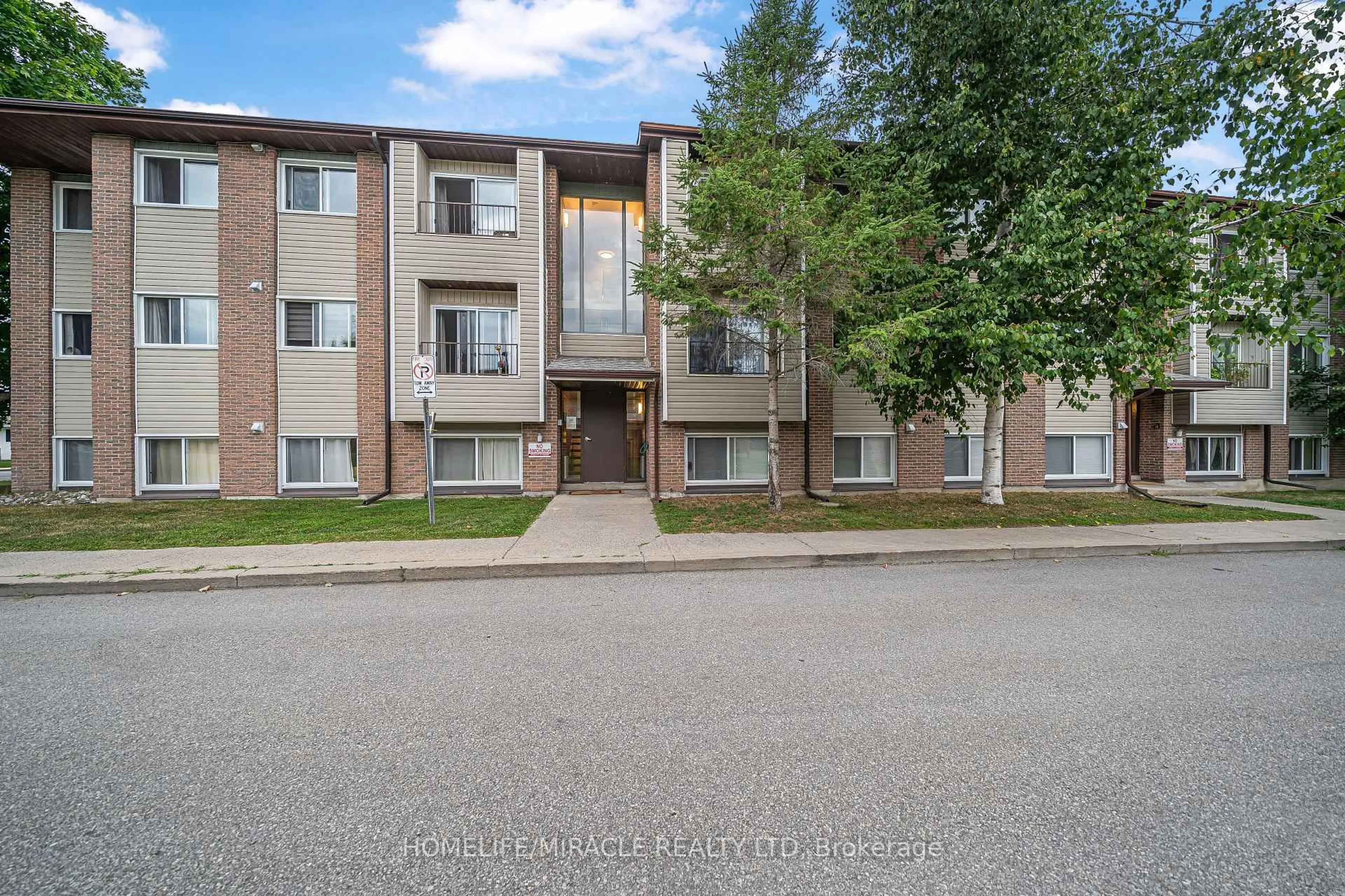 A pic from outside/outdoor area/front of a property/back of a property/a pic from drone, street for 323 Main St #305, Merrickville-Wolford Ontario K0G 1N0