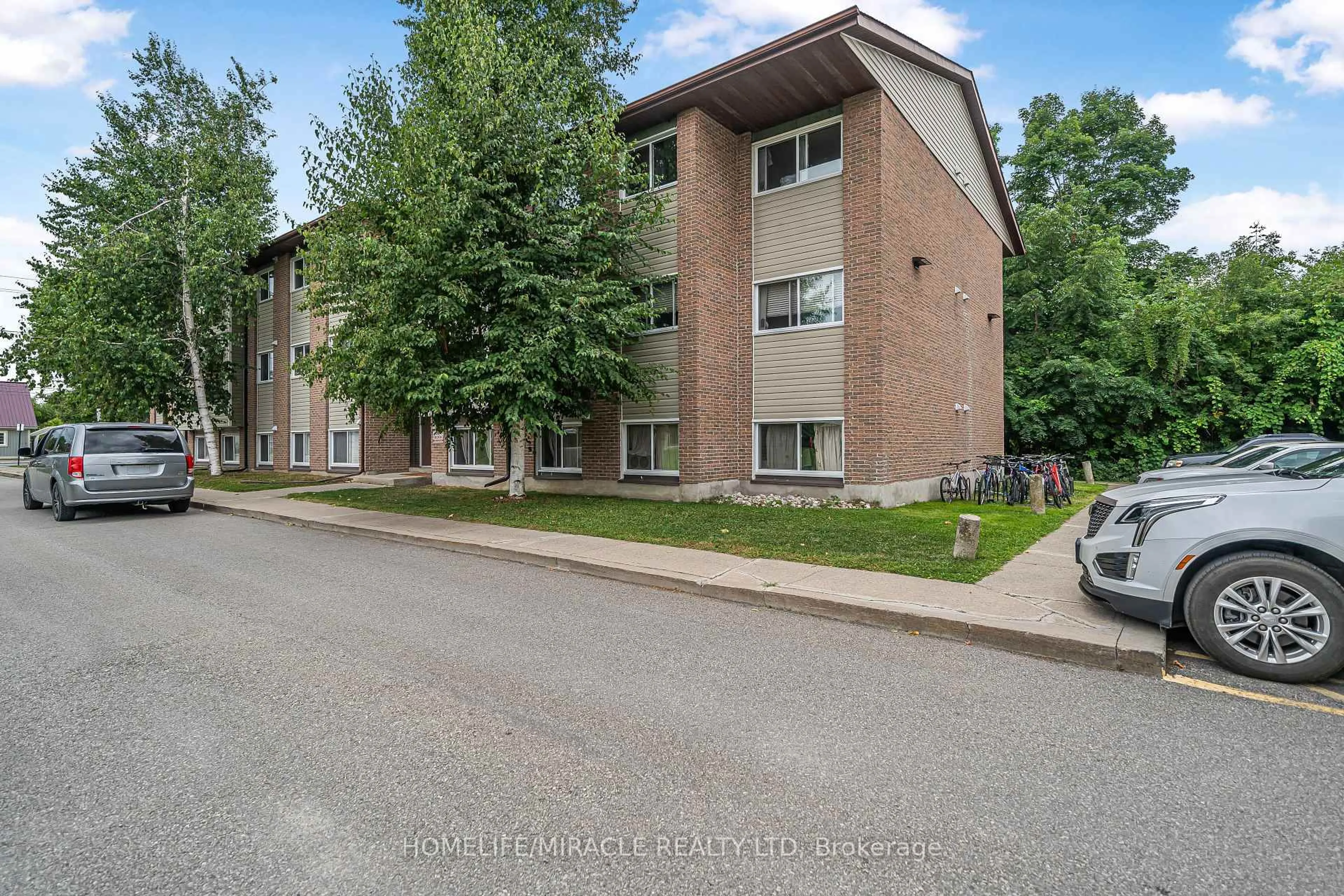A pic from outside/outdoor area/front of a property/back of a property/a pic from drone, street for 323 Main St #305, Merrickville-Wolford Ontario K0G 1N0