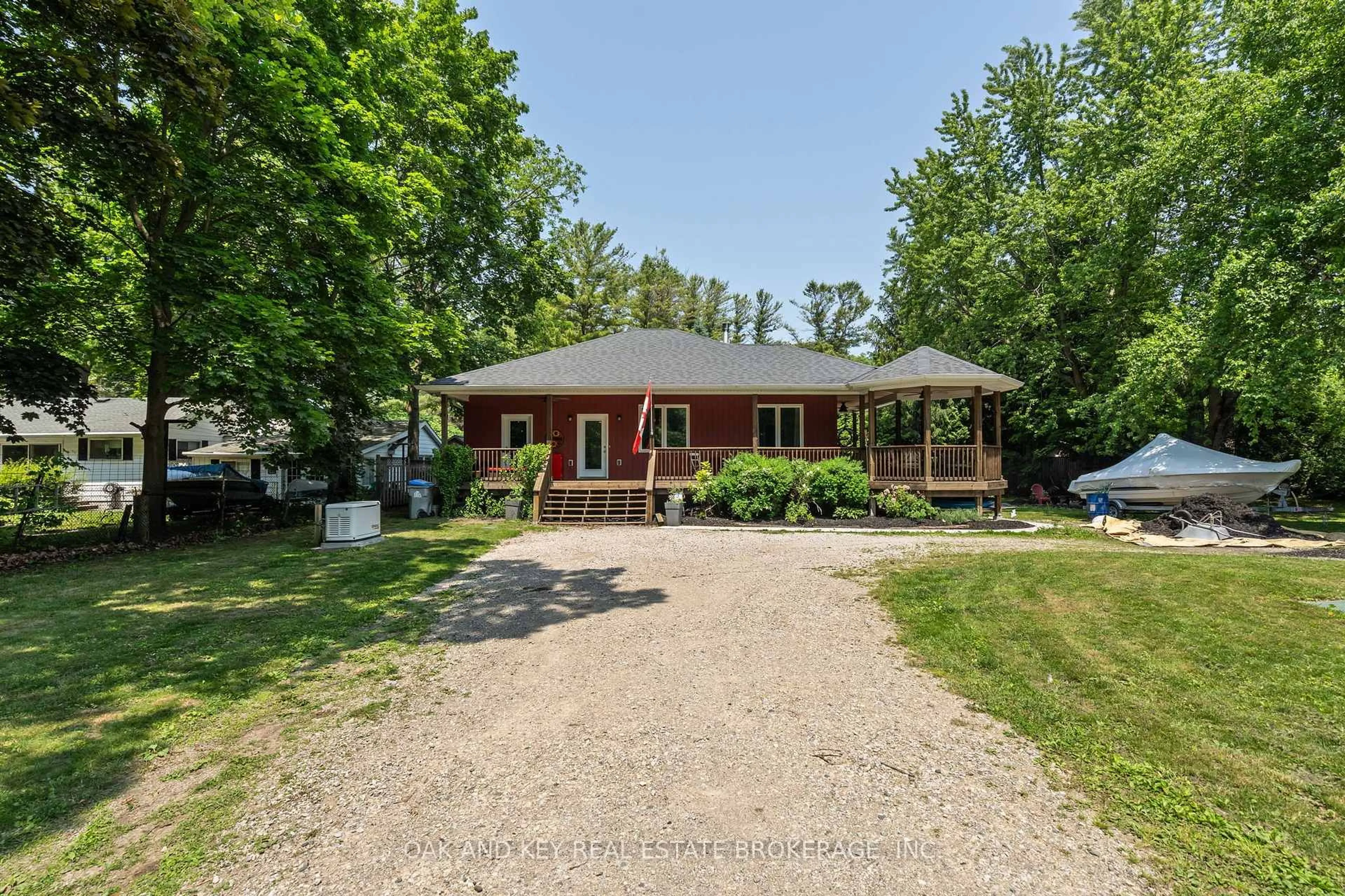 A pic from outside/outdoor area/front of a property/back of a property/a pic from drone, street for 10016 Port Franks Rd, Lambton Shores Ontario N0M 2L0