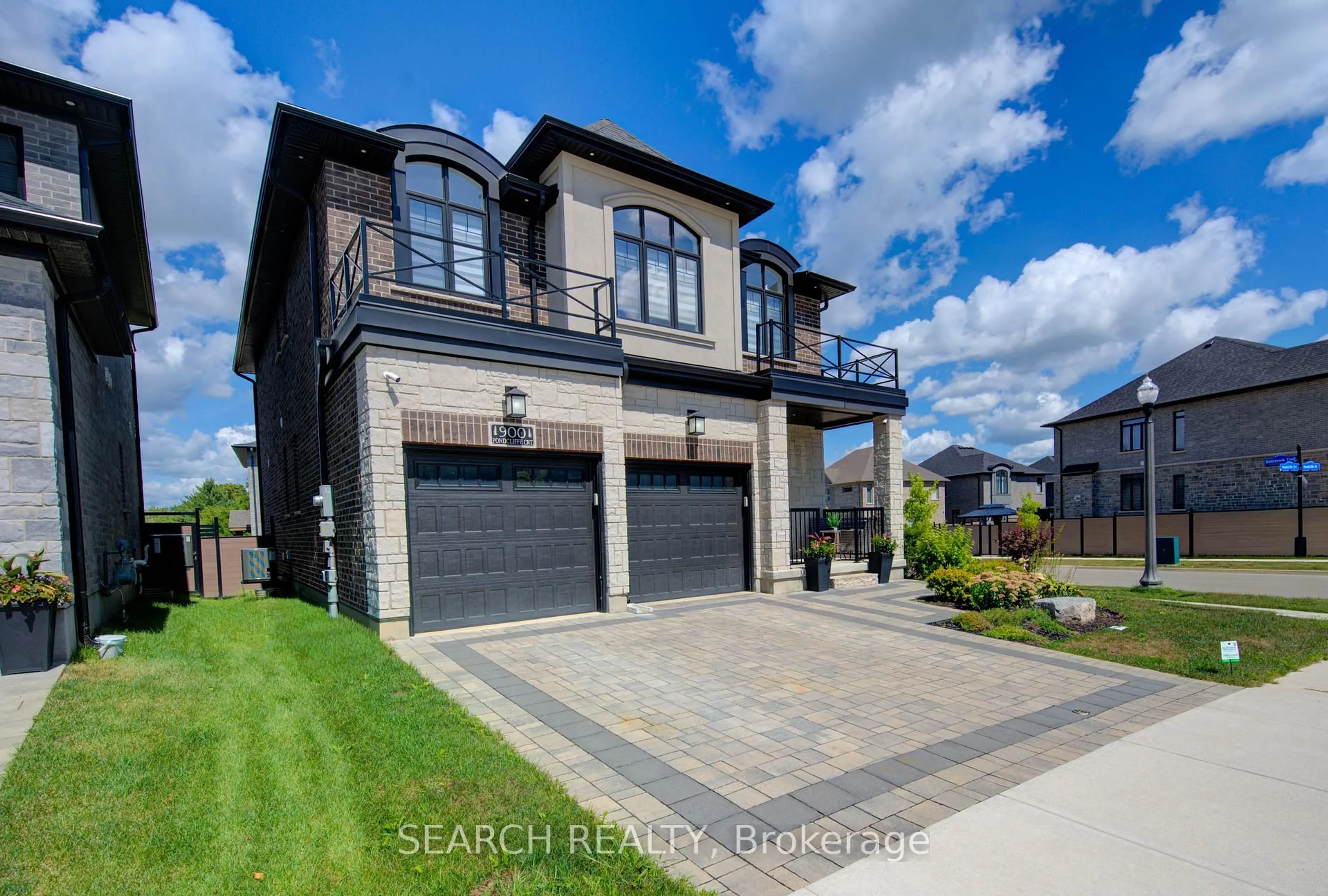 Home with brick exterior material, street for 900 Pondcliffe Crt, Kitchener Ontario N2R 0M4