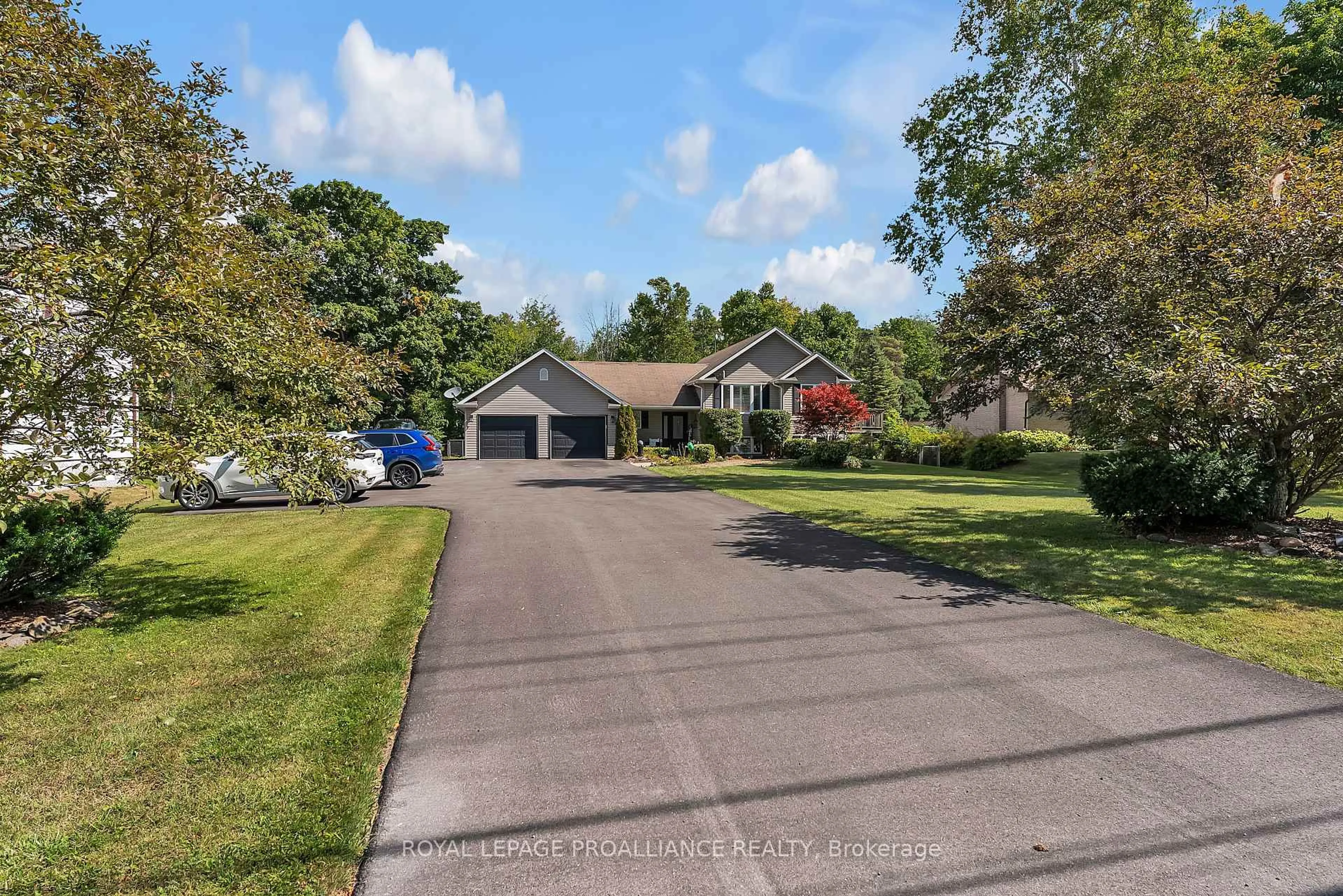 A pic from outside/outdoor area/front of a property/back of a property/a pic from drone, water/lake/river/ocean view for 21859 Loyalist Pkwy, Quinte West Ontario K0K 1L0