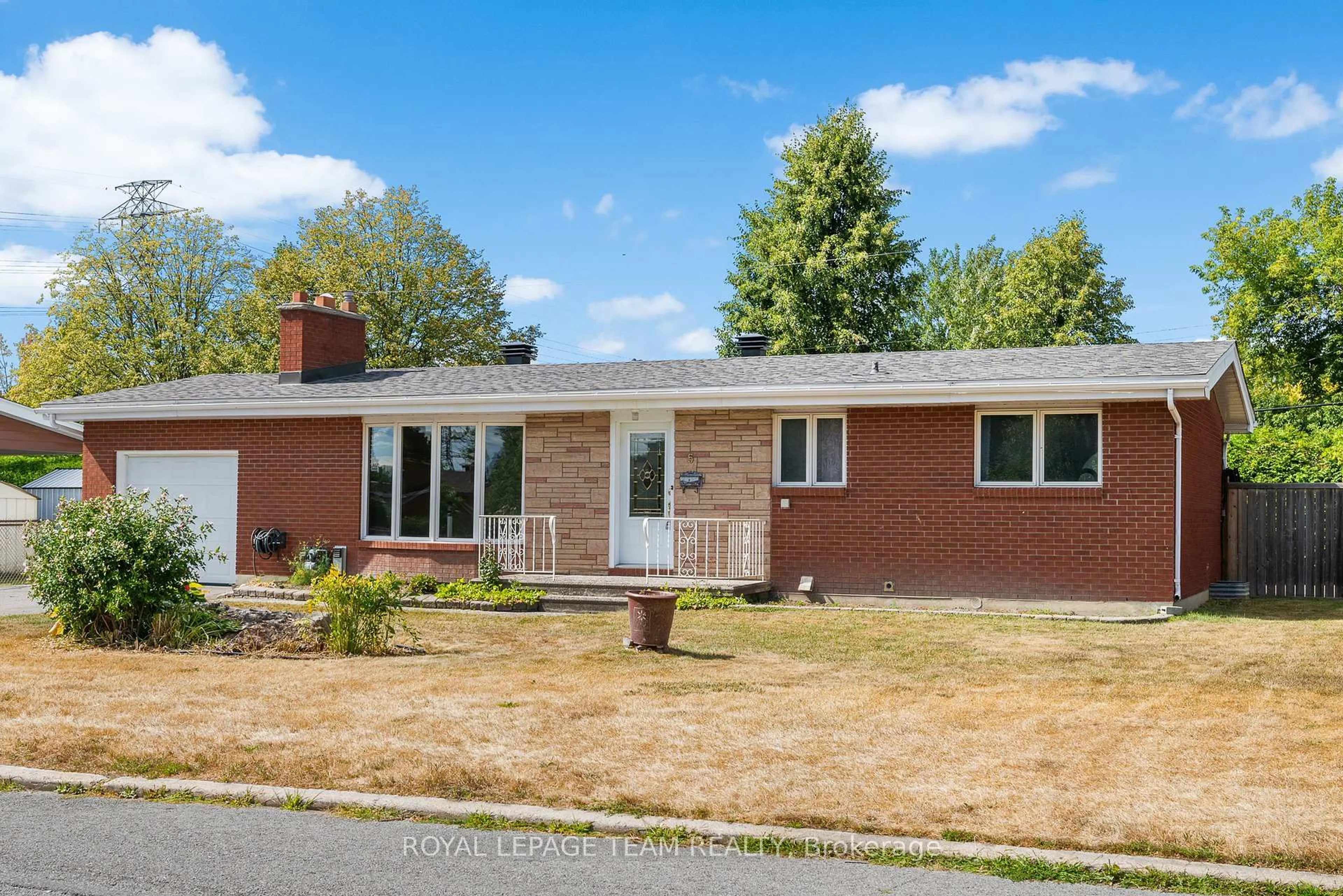 Home with brick exterior material, street for 5 Spring Garden Ave, Ottawa Ontario K2G 3B1