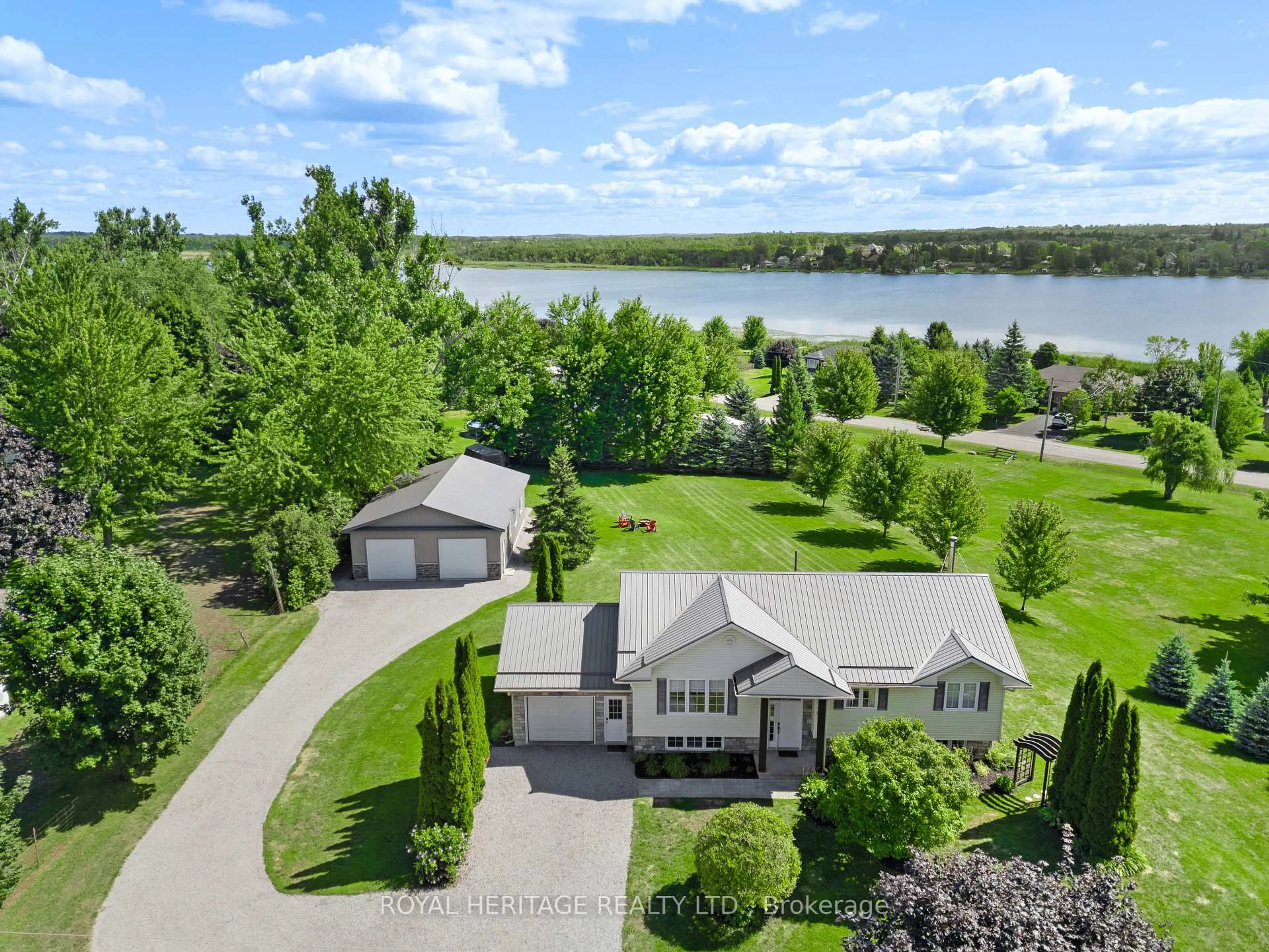 A pic from outside/outdoor area/front of a property/back of a property/a pic from drone, water/lake/river/ocean view for 108 Beach Rd, Kawartha Lakes Ontario K0M 2C0