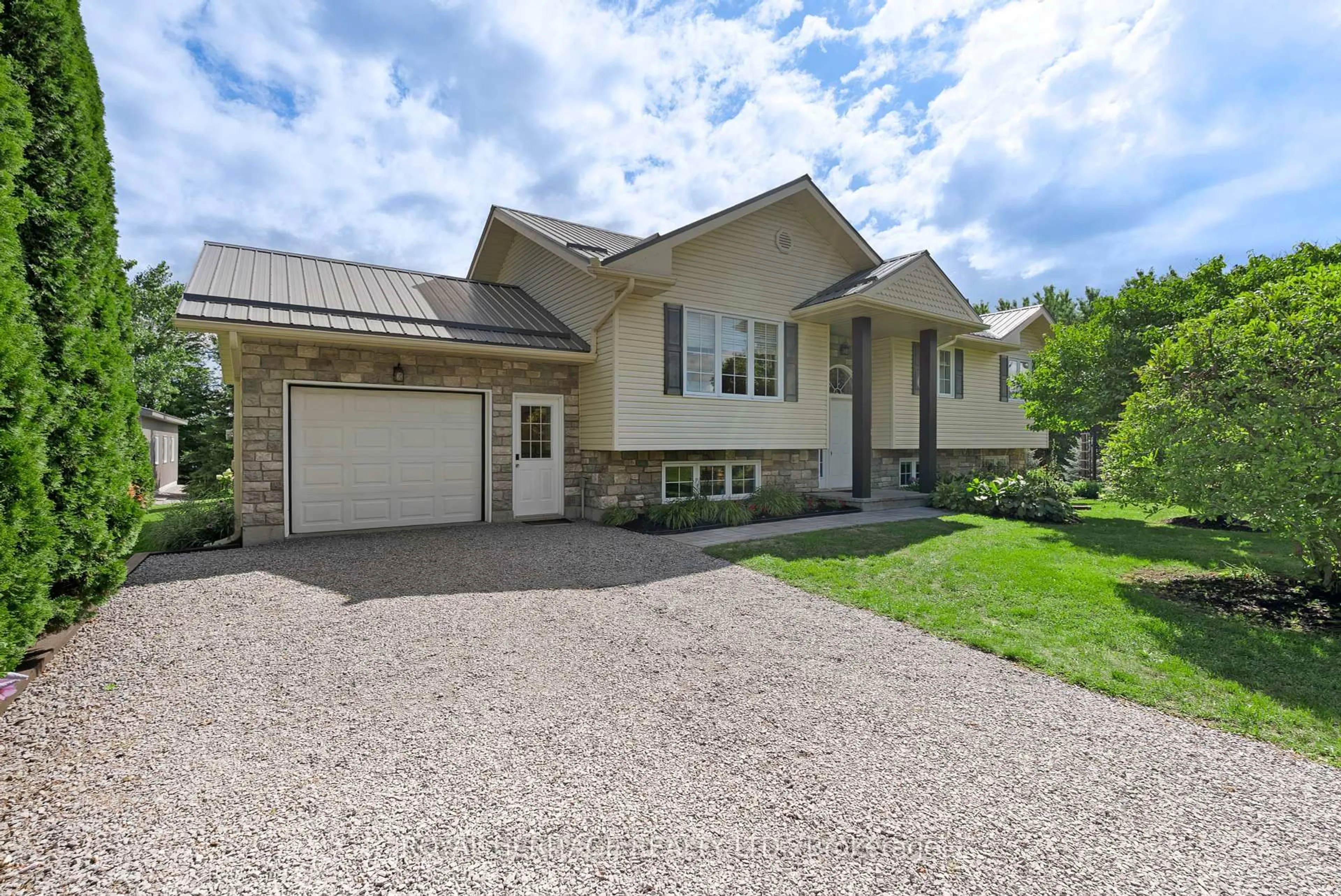 A pic from outside/outdoor area/front of a property/back of a property/a pic from drone, street for 108 Beach Rd, Kawartha Lakes Ontario K0M 2C0