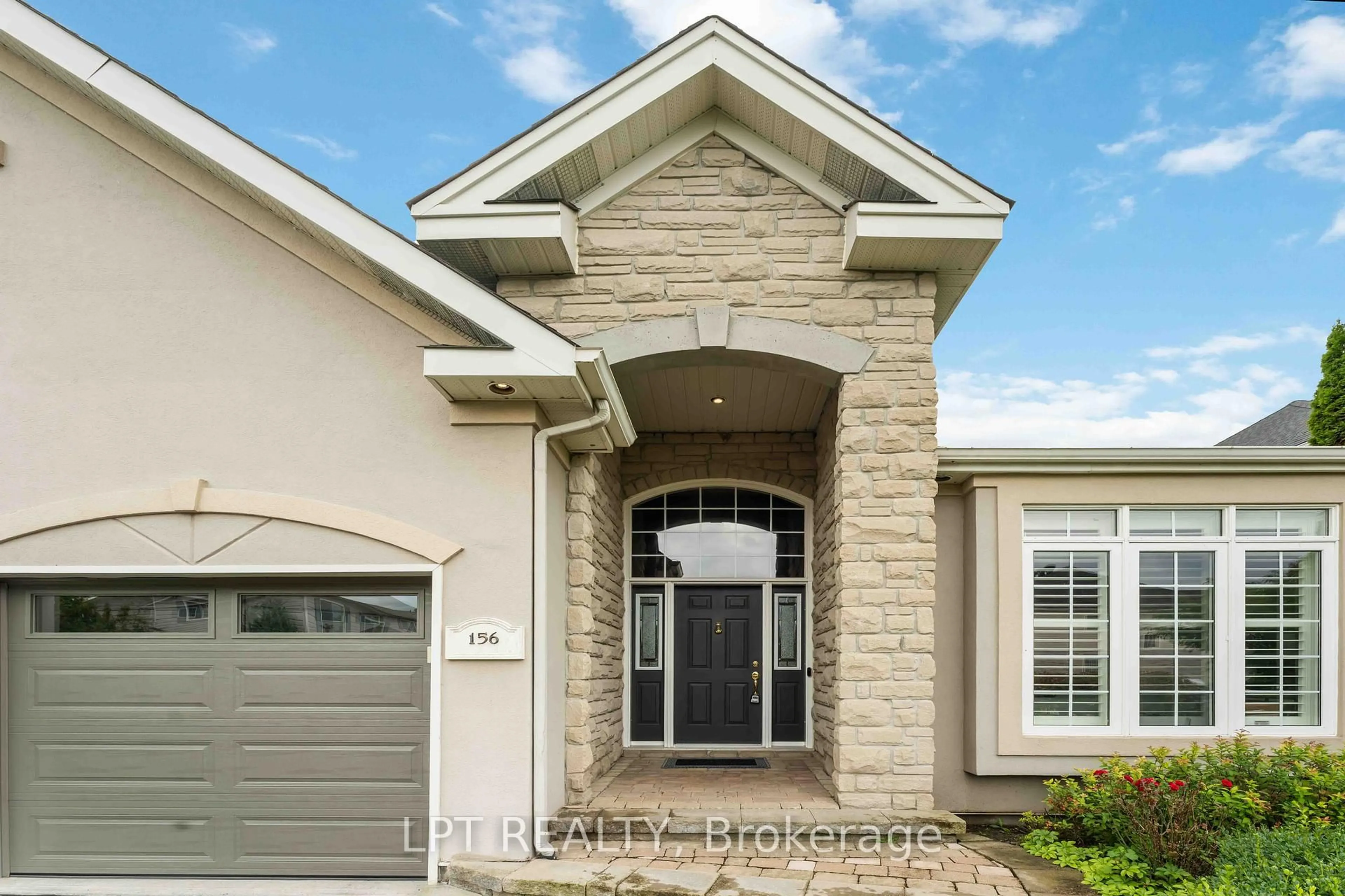 Home with brick exterior material, street for 156 Riverstone Dr, Ottawa Ontario K2J 5E4