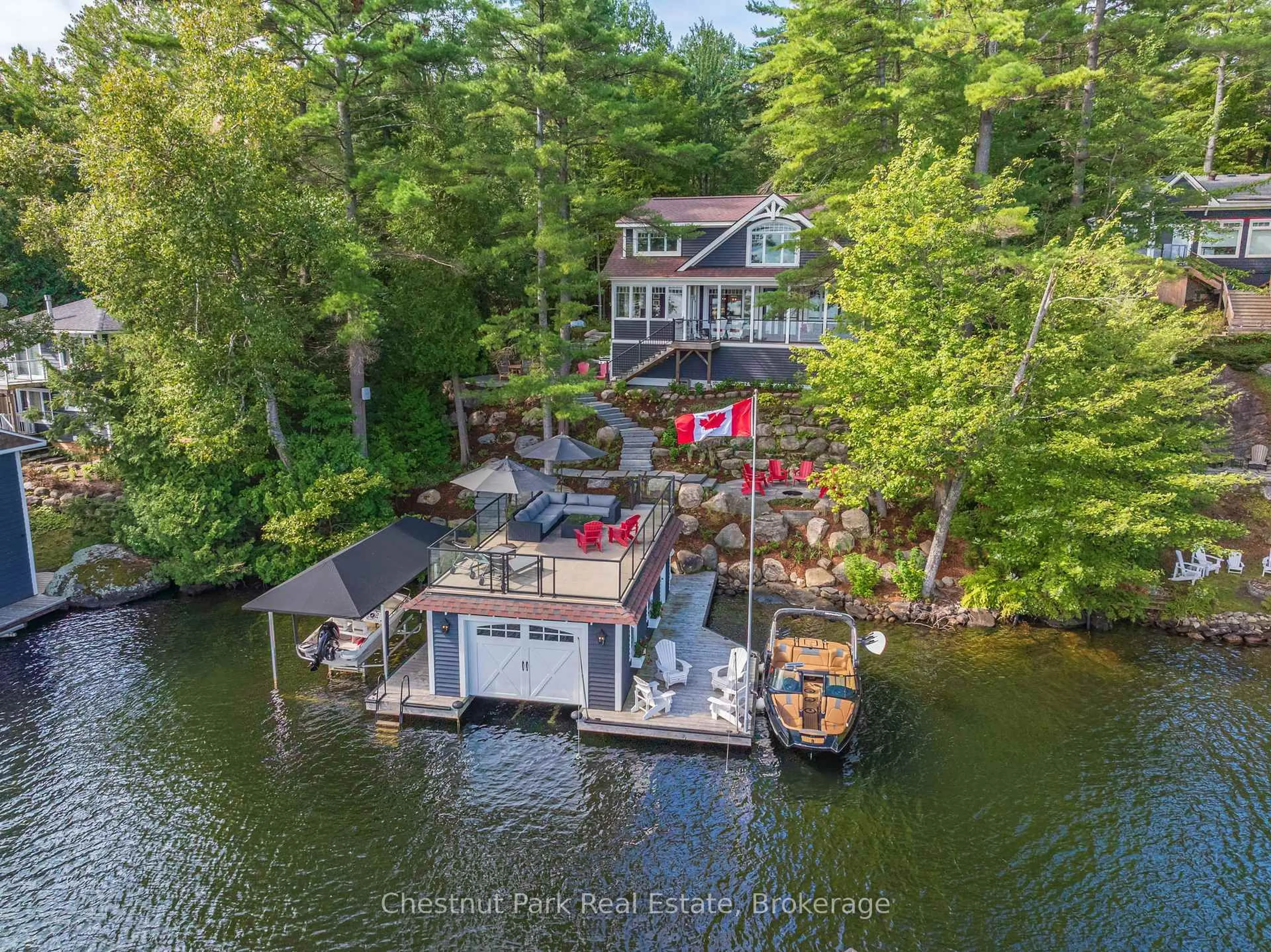 A pic from outside/outdoor area/front of a property/back of a property/a pic from drone, water/lake/river/ocean view for 1026 3300 Rd, Gravenhurst Ontario P1P 1R2
