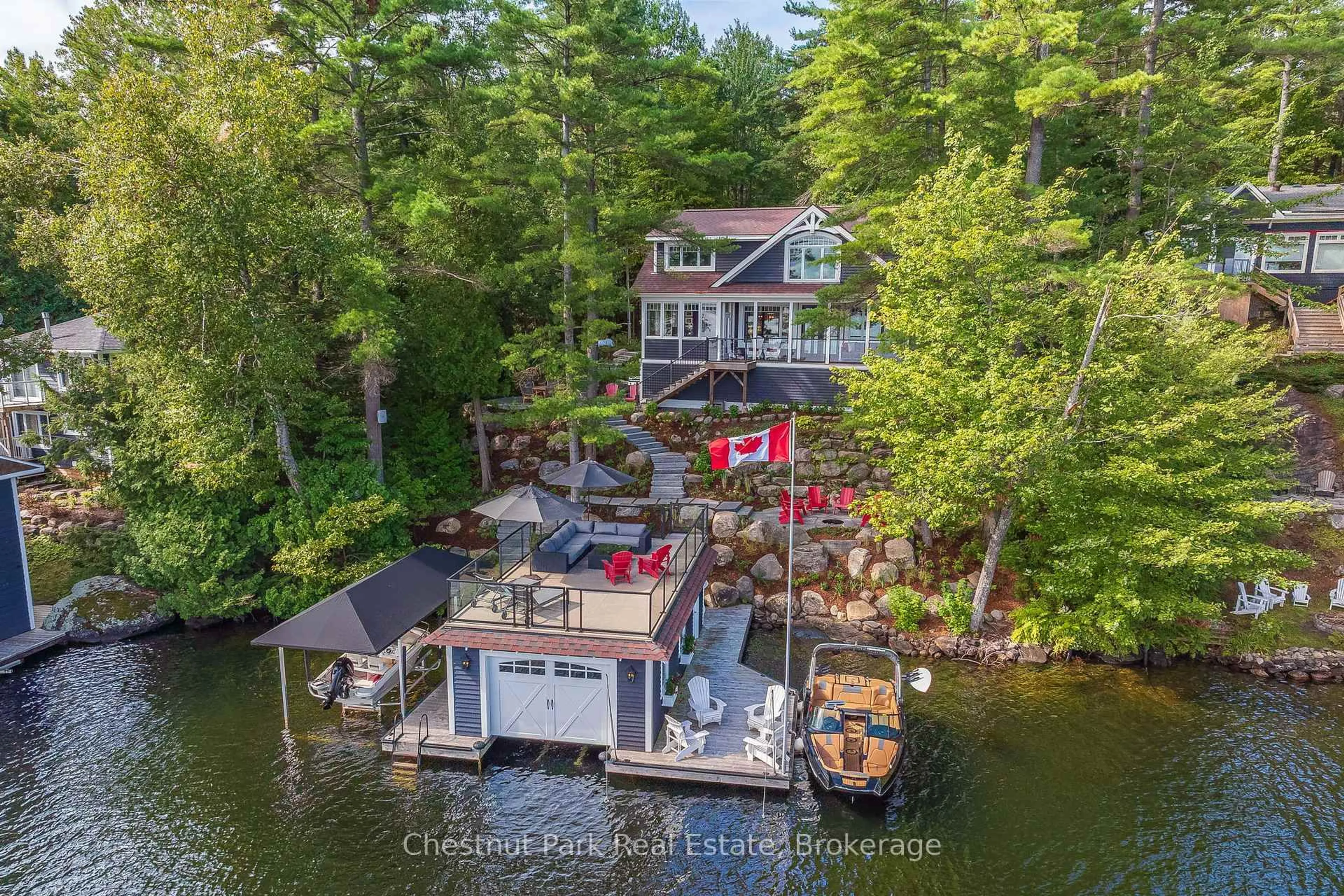 A pic from outside/outdoor area/front of a property/back of a property/a pic from drone, water/lake/river/ocean view for 1026 3300 Rd, Gravenhurst Ontario P1P 1R2