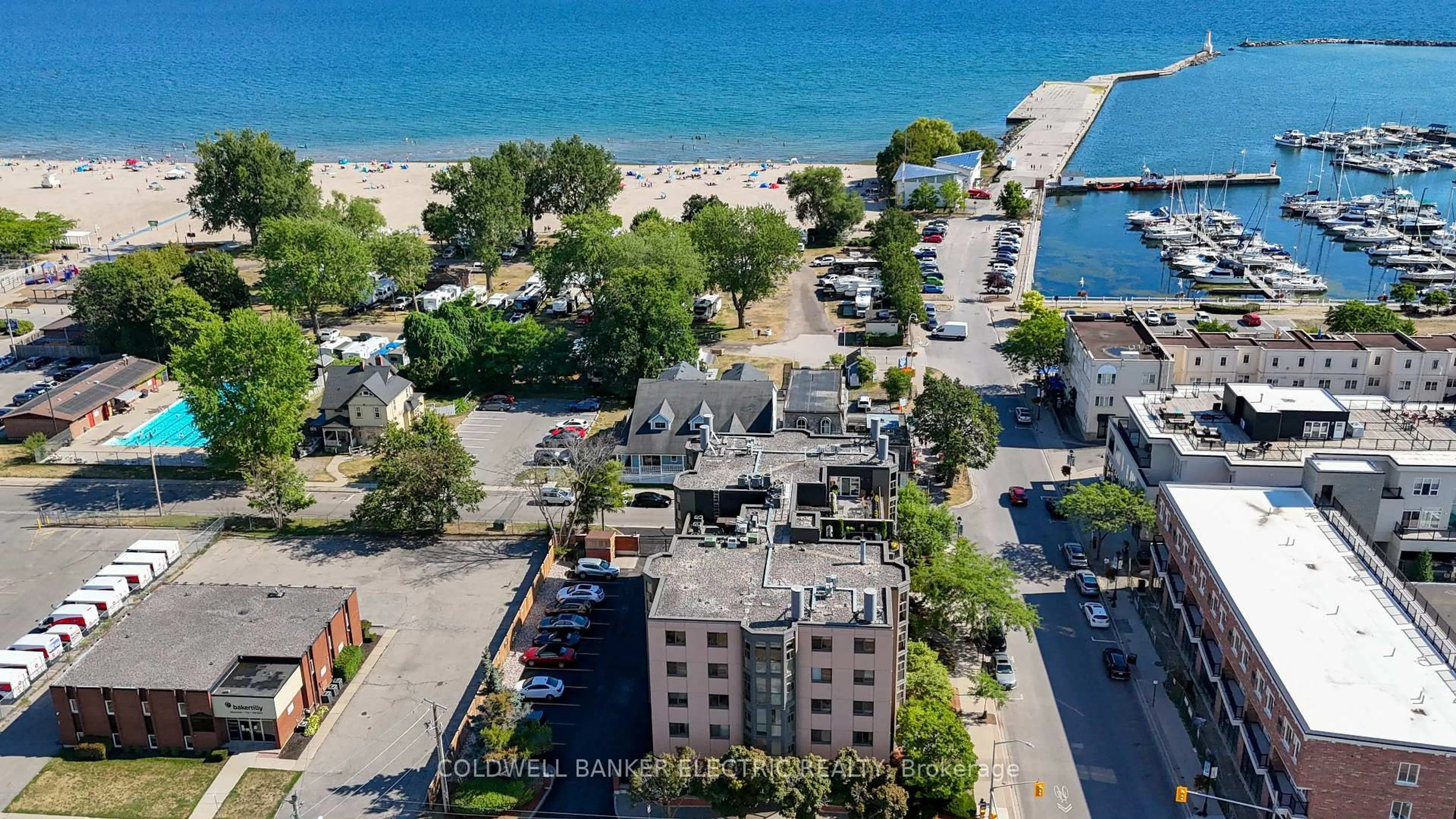 A pic from outside/outdoor area/front of a property/back of a property/a pic from drone, unknown for 1 Queen St #404, Cobourg Ontario K9A 1M8