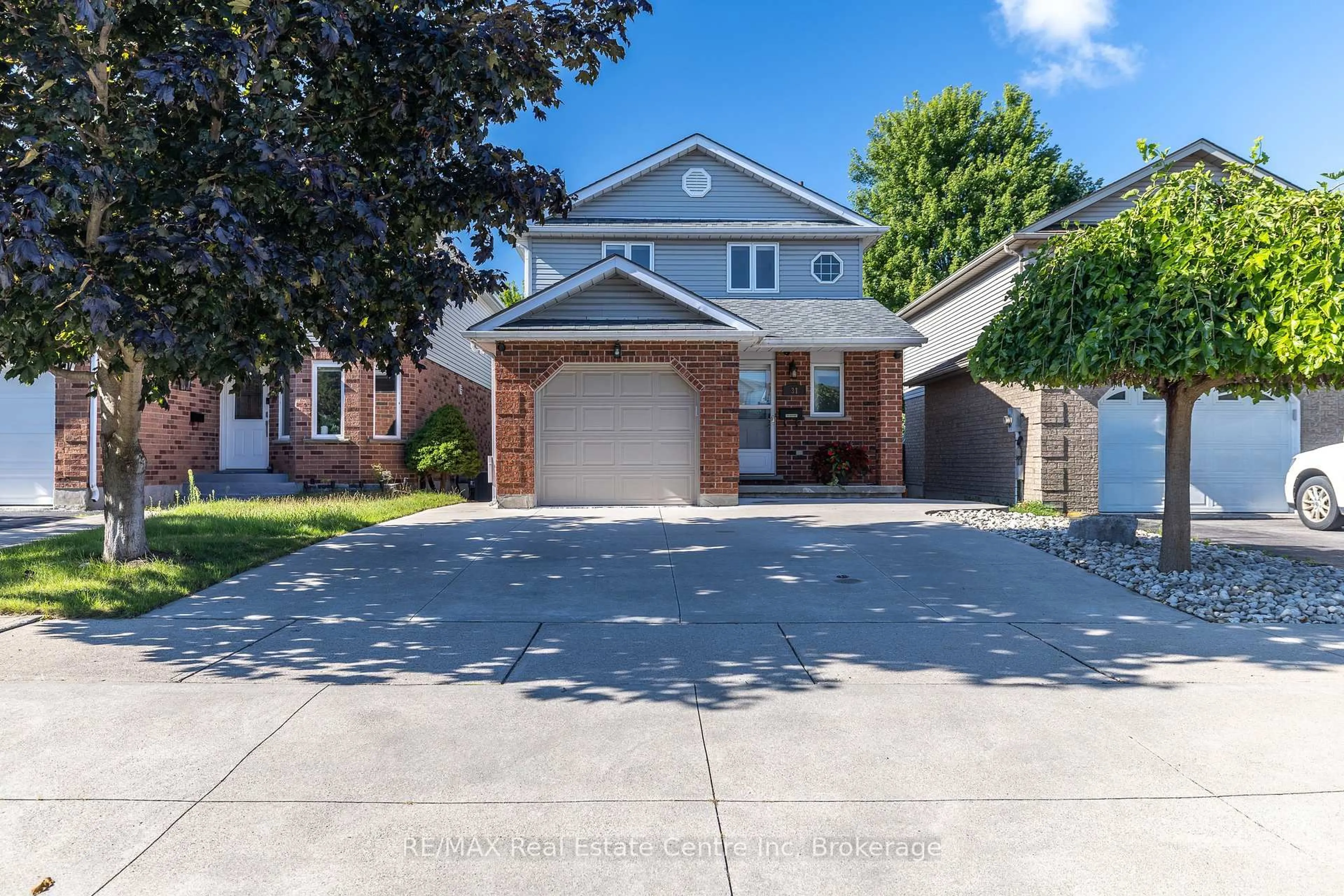 Home with brick exterior material, street for 31 Bushmills Cres, Guelph Ontario N1K 1T6